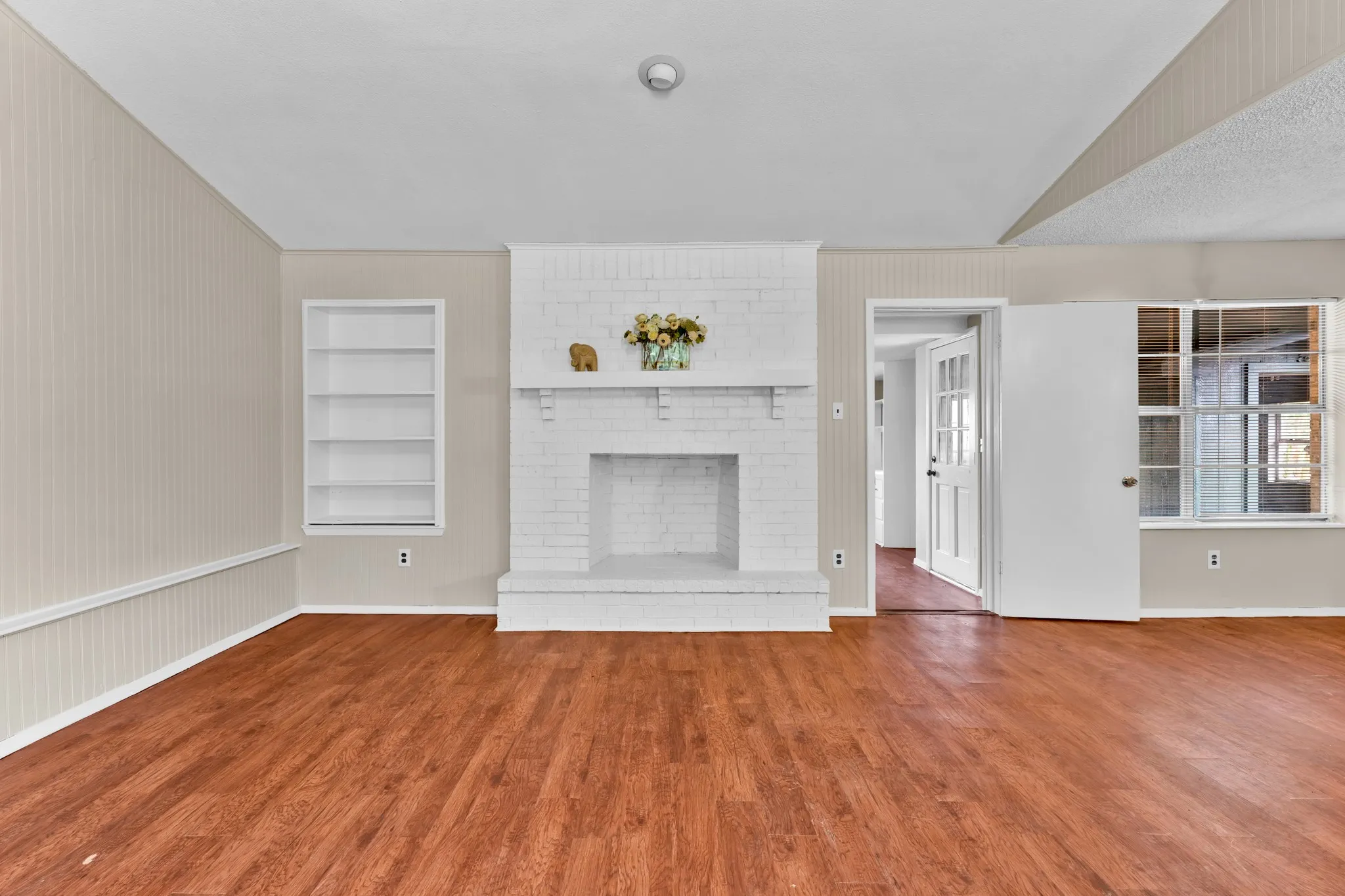 WBFP with mantle and bookcases