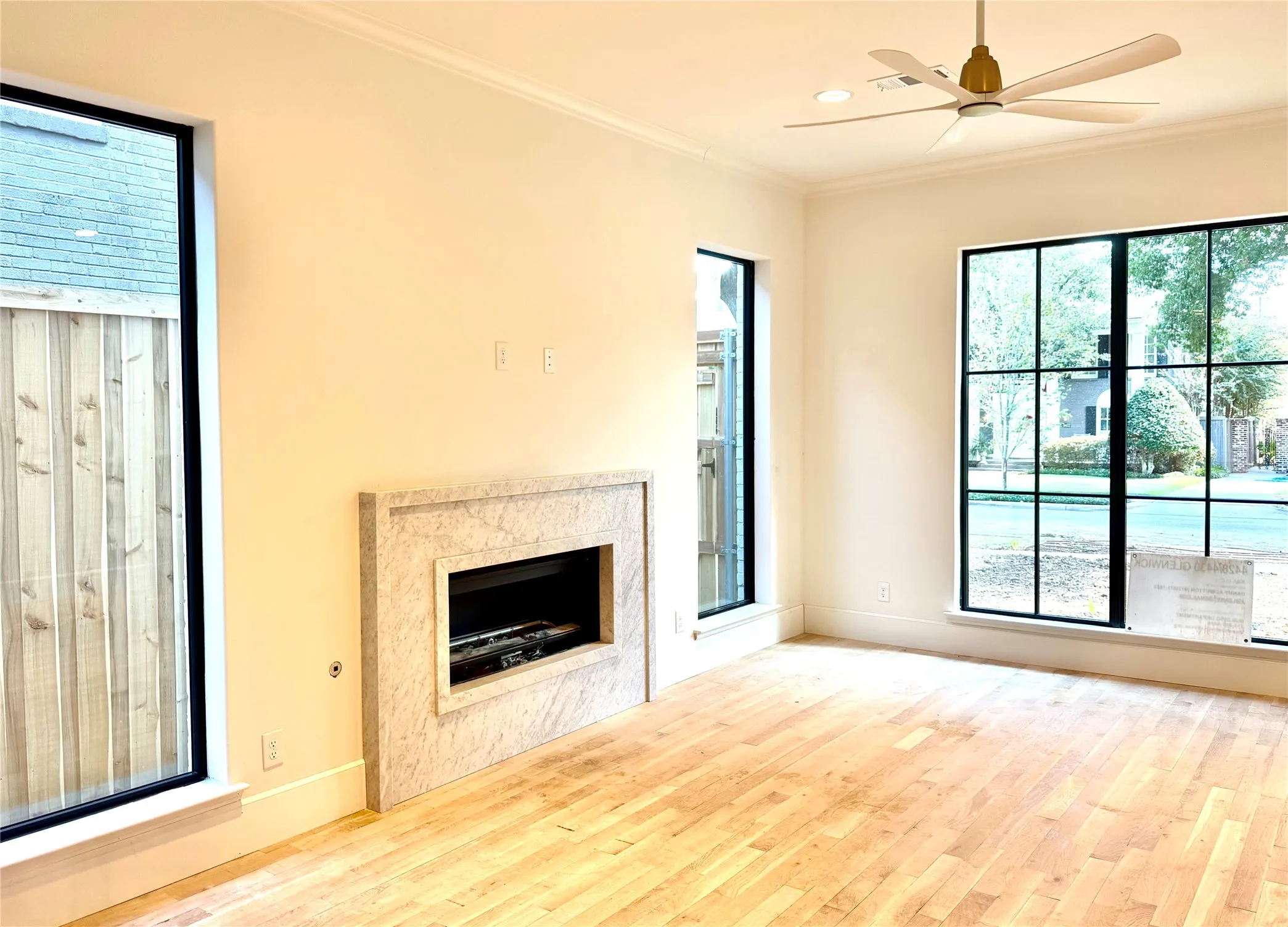 Living Area with fireplace overlooking the front yard