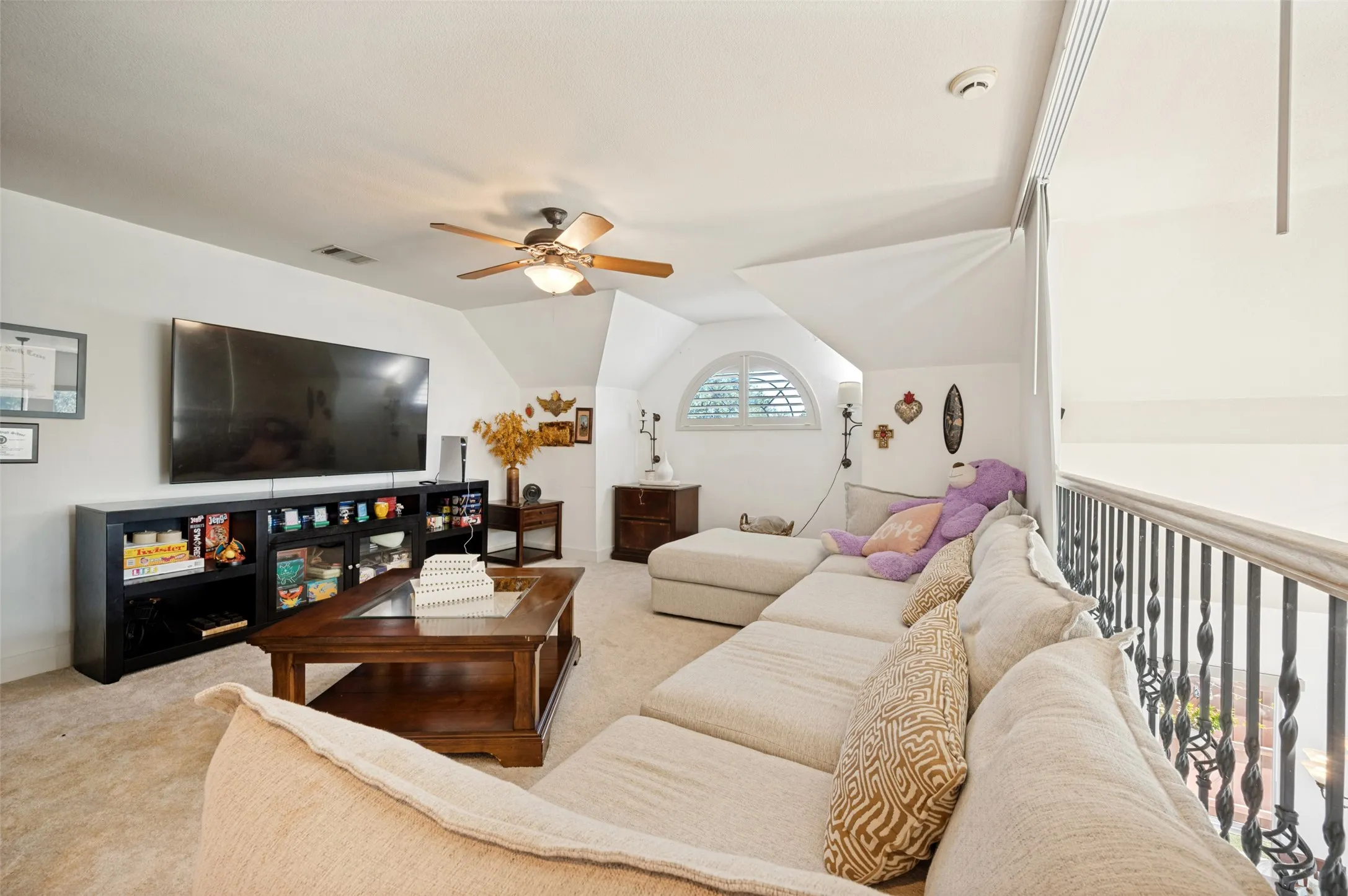Third living area with shades that close for total blackout for watching TV