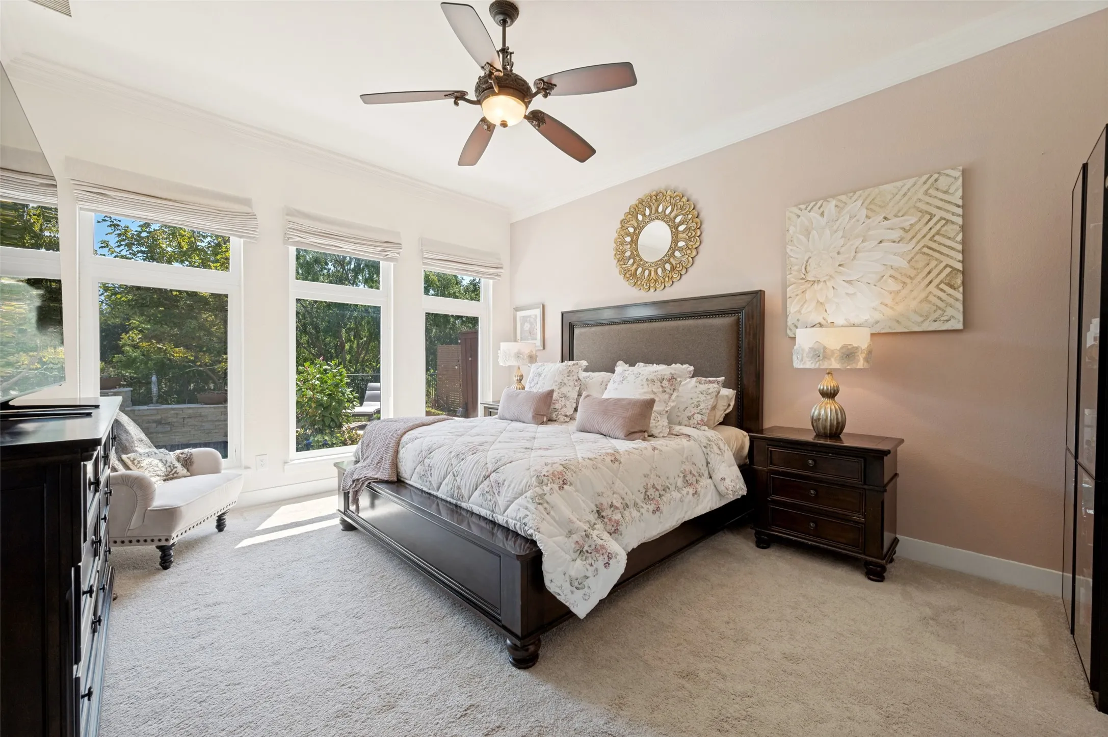 Primary bedroom with views of the pool