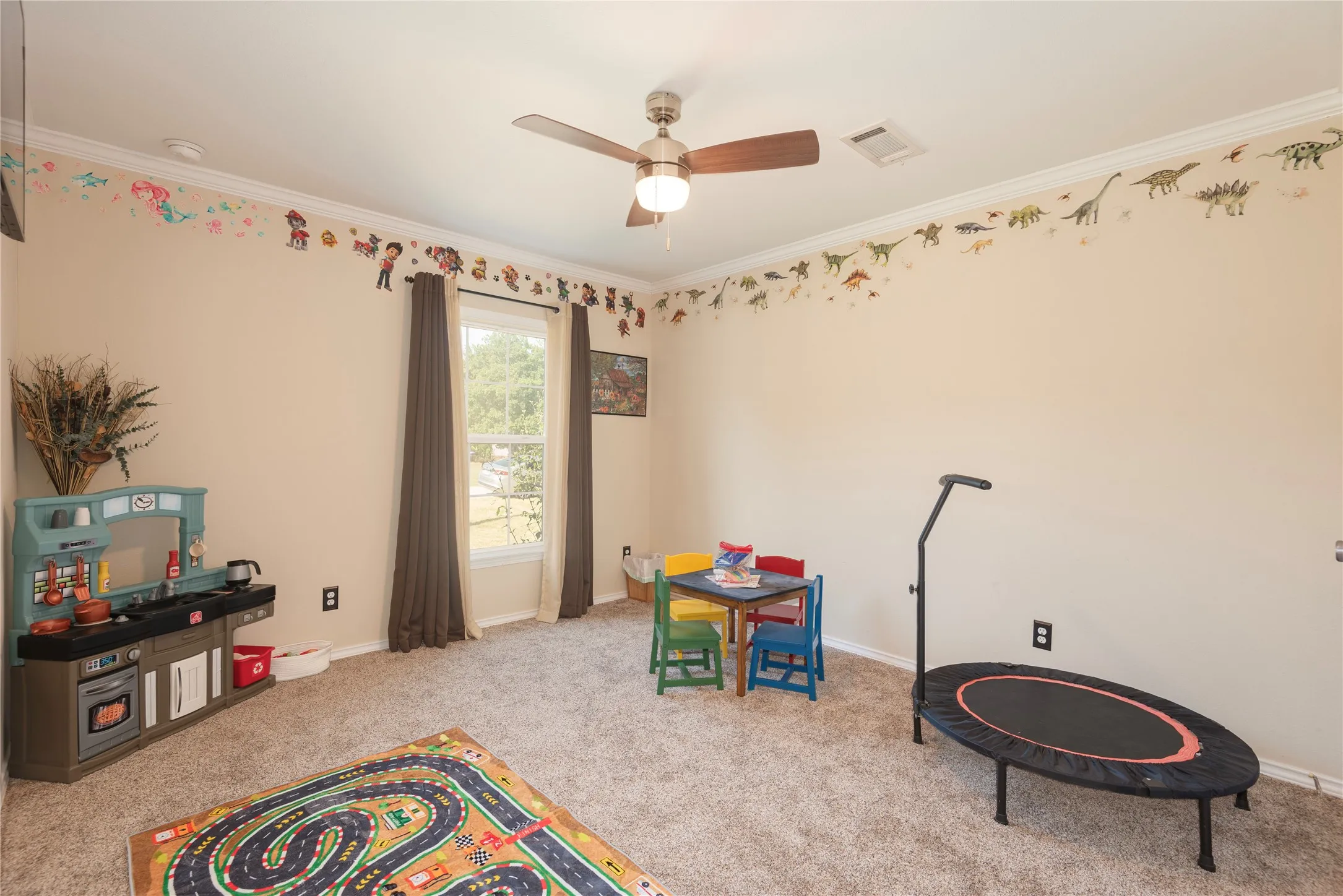 Neutral-toned walls complement plush carpeting