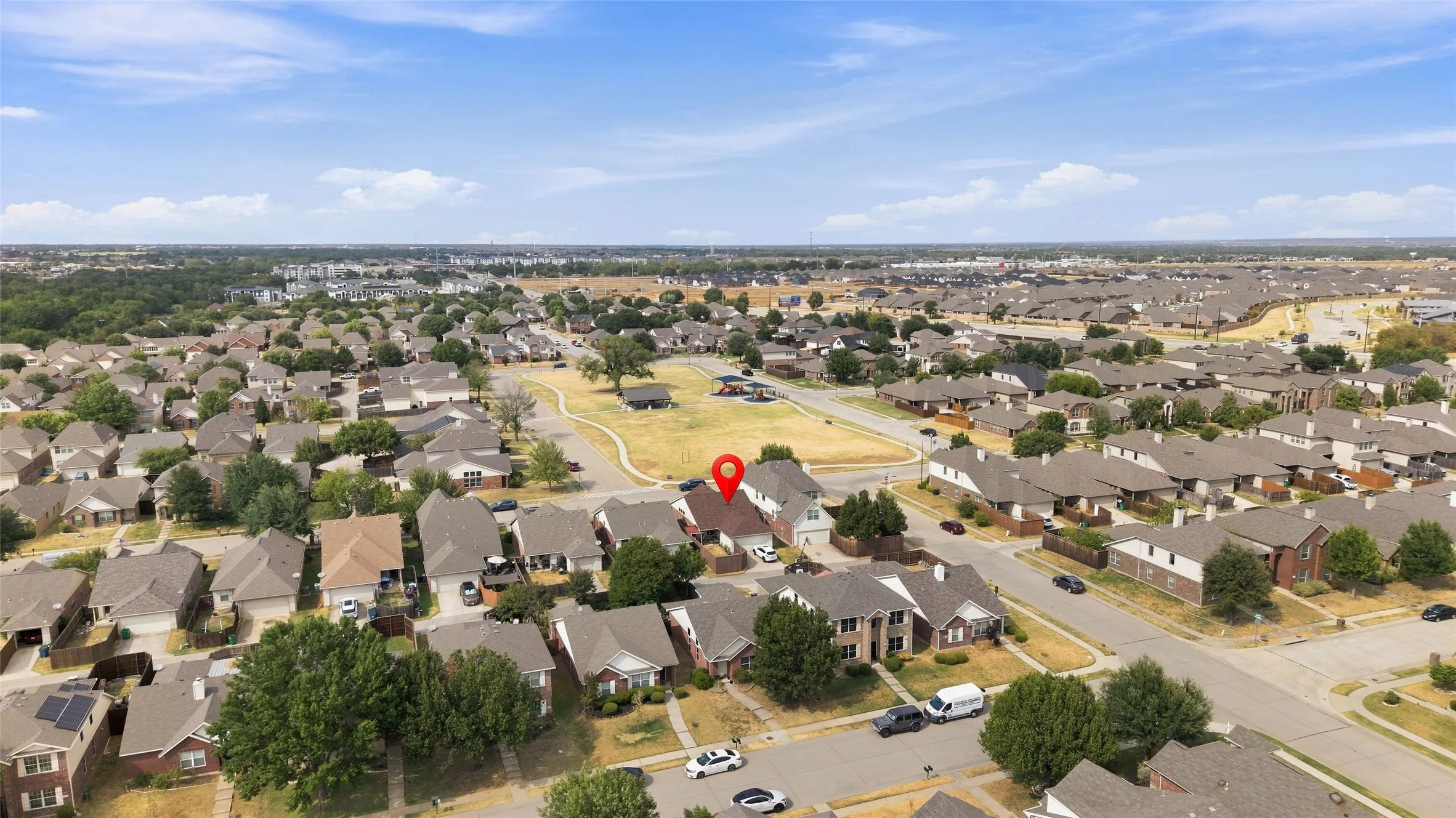Residential neighborhood setting with established homes and mature trees