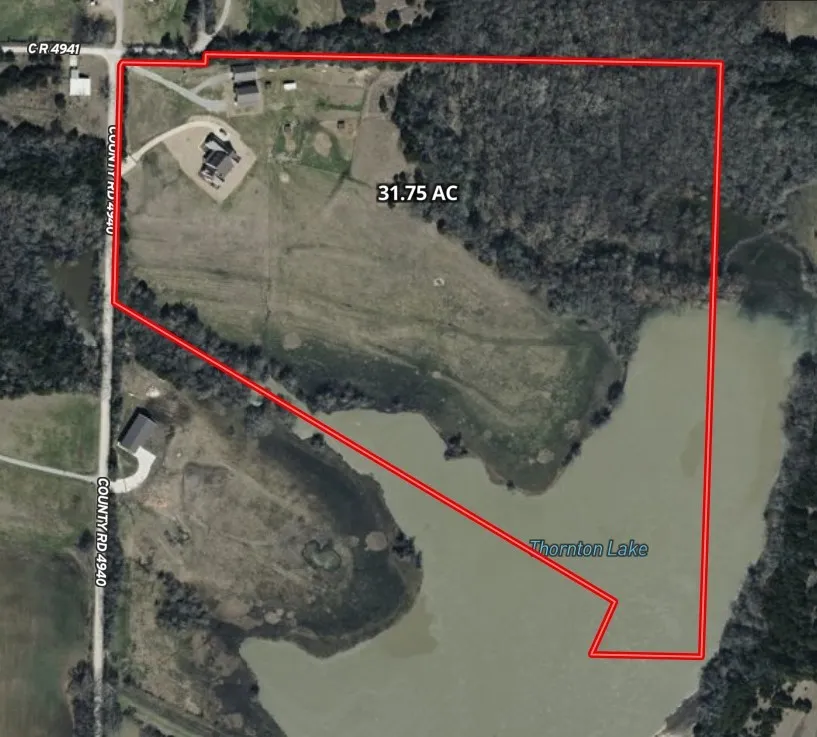 Property Survey. An aerial view outlining the property boundaries and acreage