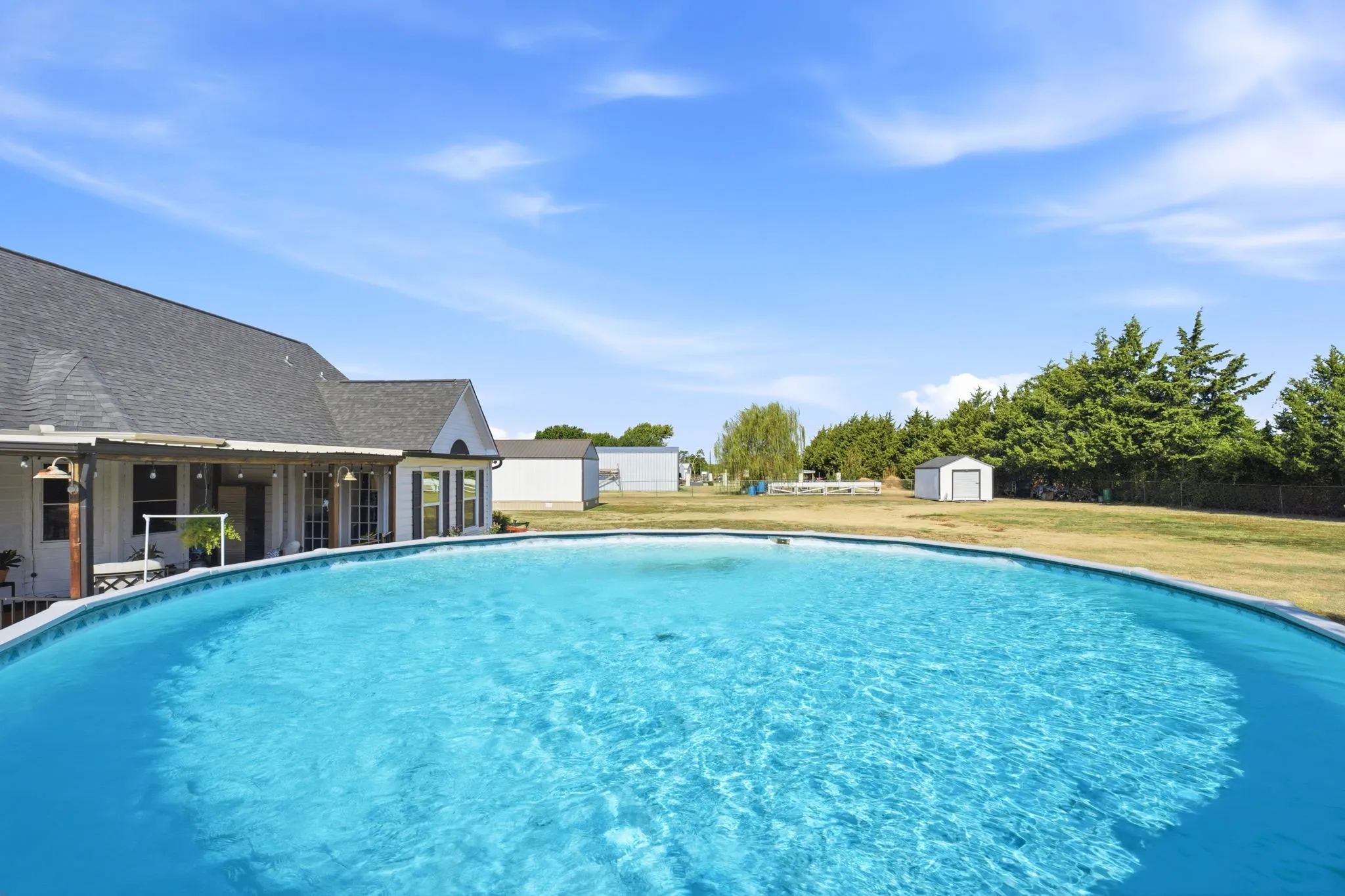 Large pool with a built-in lounging deck