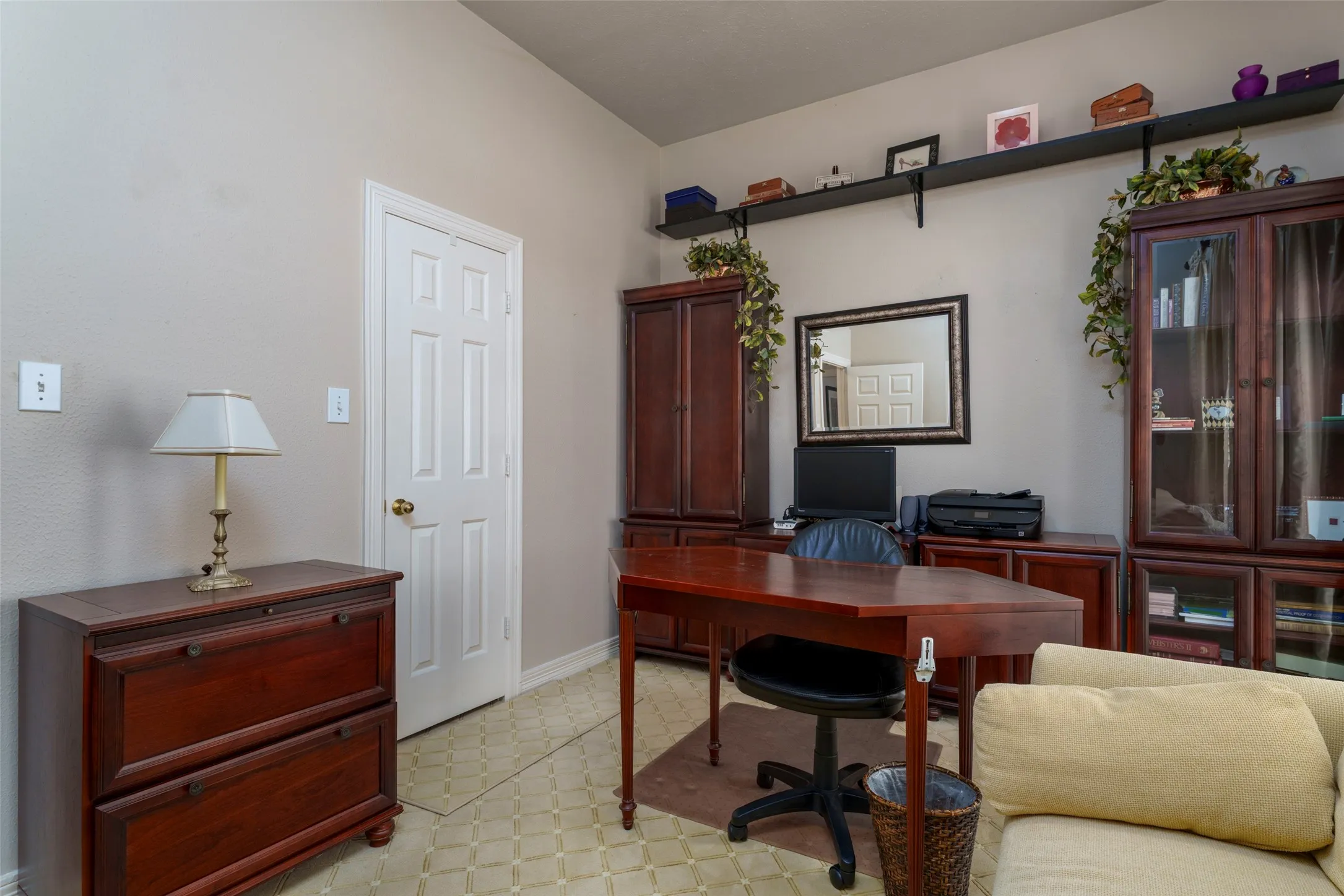 White paneled door, light-toned walls, and geometric pattern​​‌​​​​‌​​‌‌​‌‌​​​‌‌​‌​‌​‌​​​‌​​ flooring