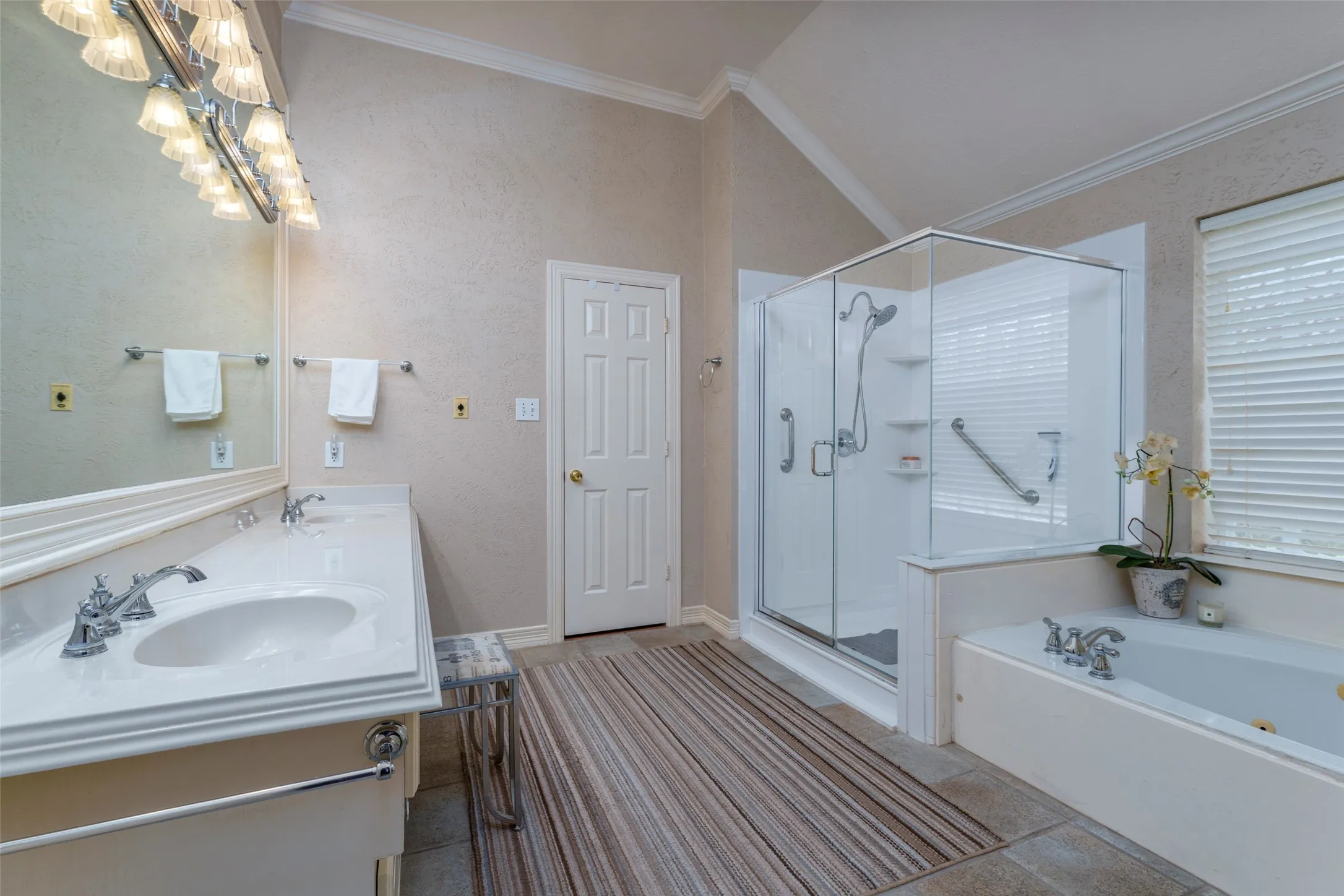 Dual vanity with integrated sinks and chrome fixtures