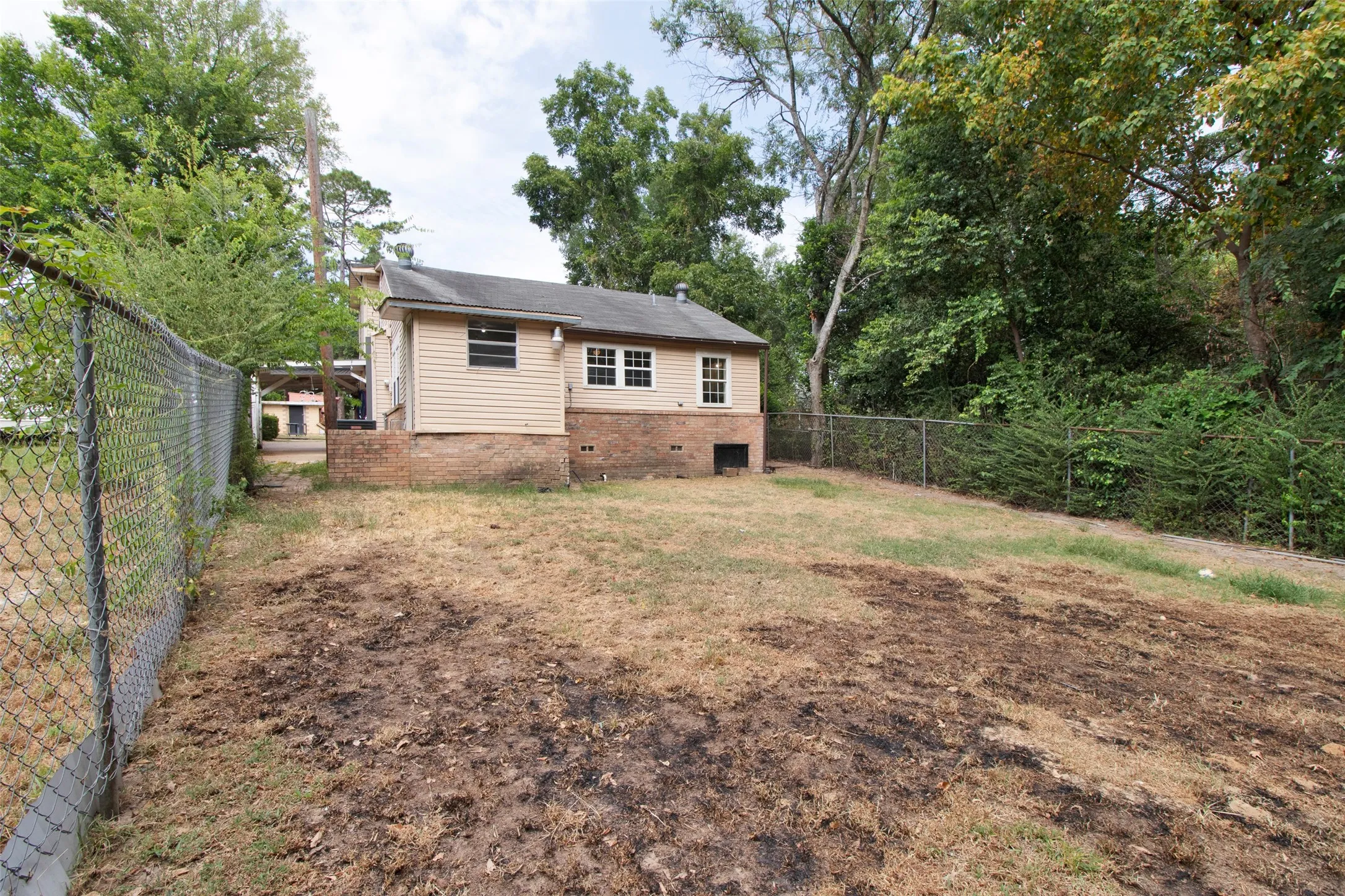 Chain link fencing enclosing the property