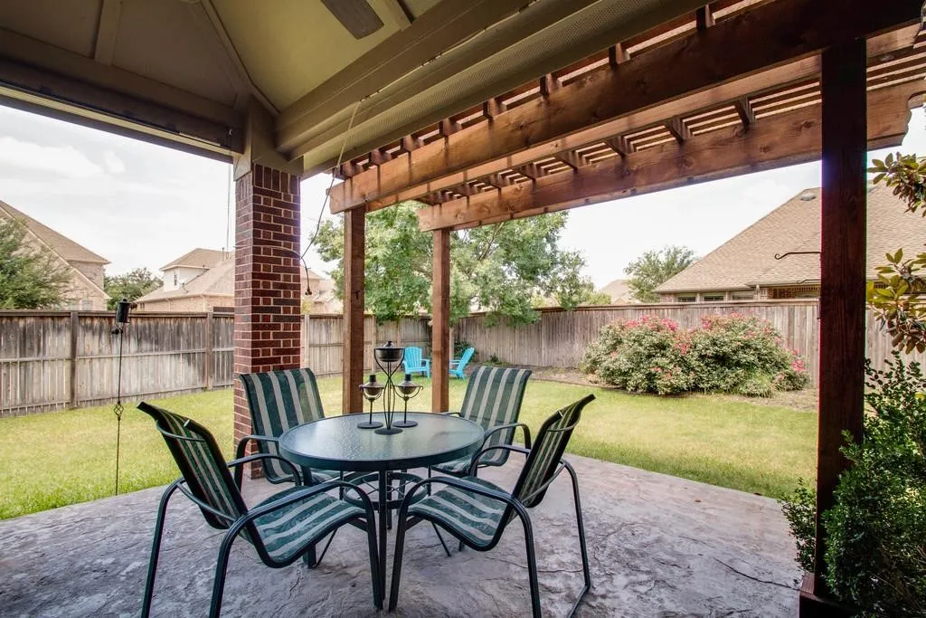 Lovely covered patio with roll down screen for the sun protection!