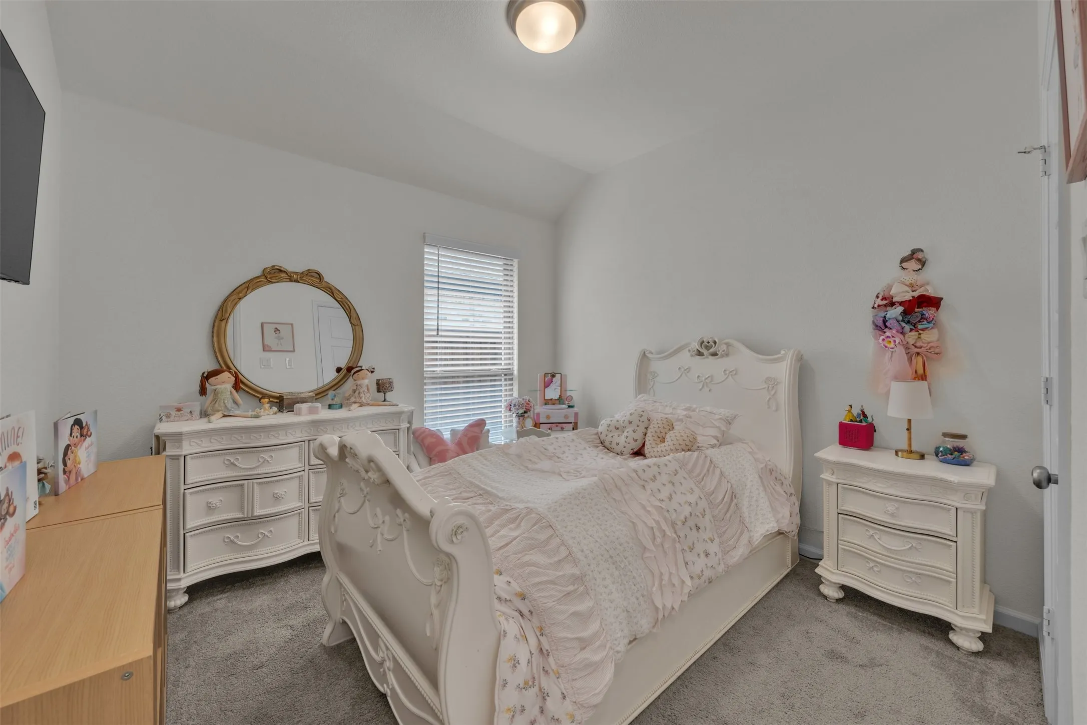 Bedroom featuring a window with blinds, wall-to-wall carpeting, and a flush mount ceiling light