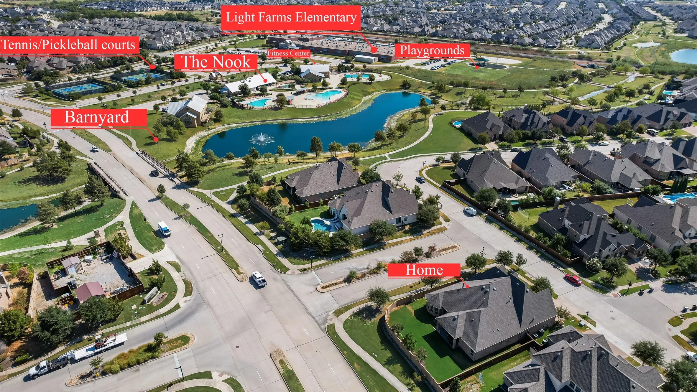 Walking distance to neighborhood amenities at the Barnyard, restaurant, tennis courts, fishing ponds, pools, gym, Light Farms Elementary School