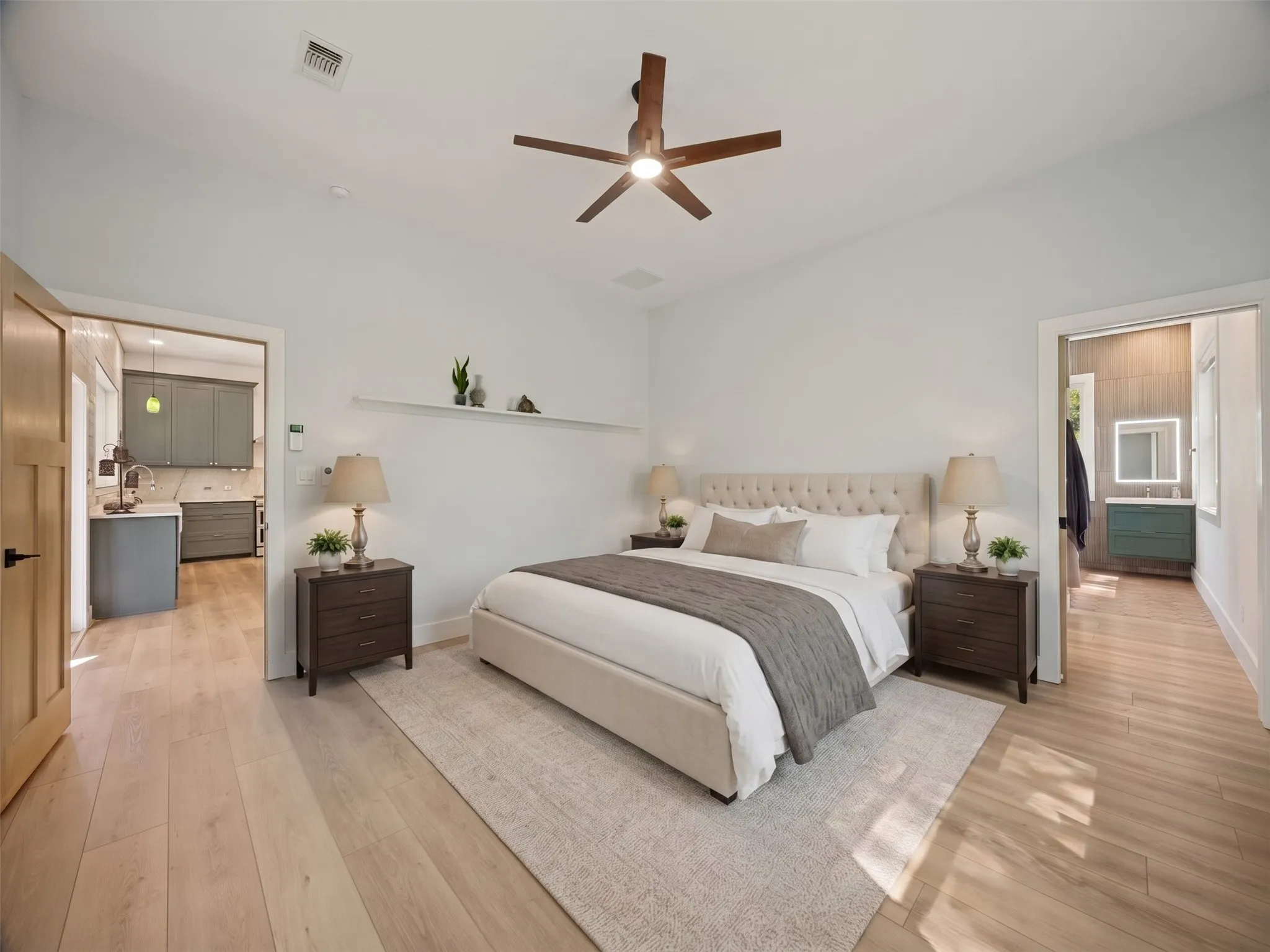Primary bedroom is located on the back of the home just off the kitchen & dining area. This has been virtually staged