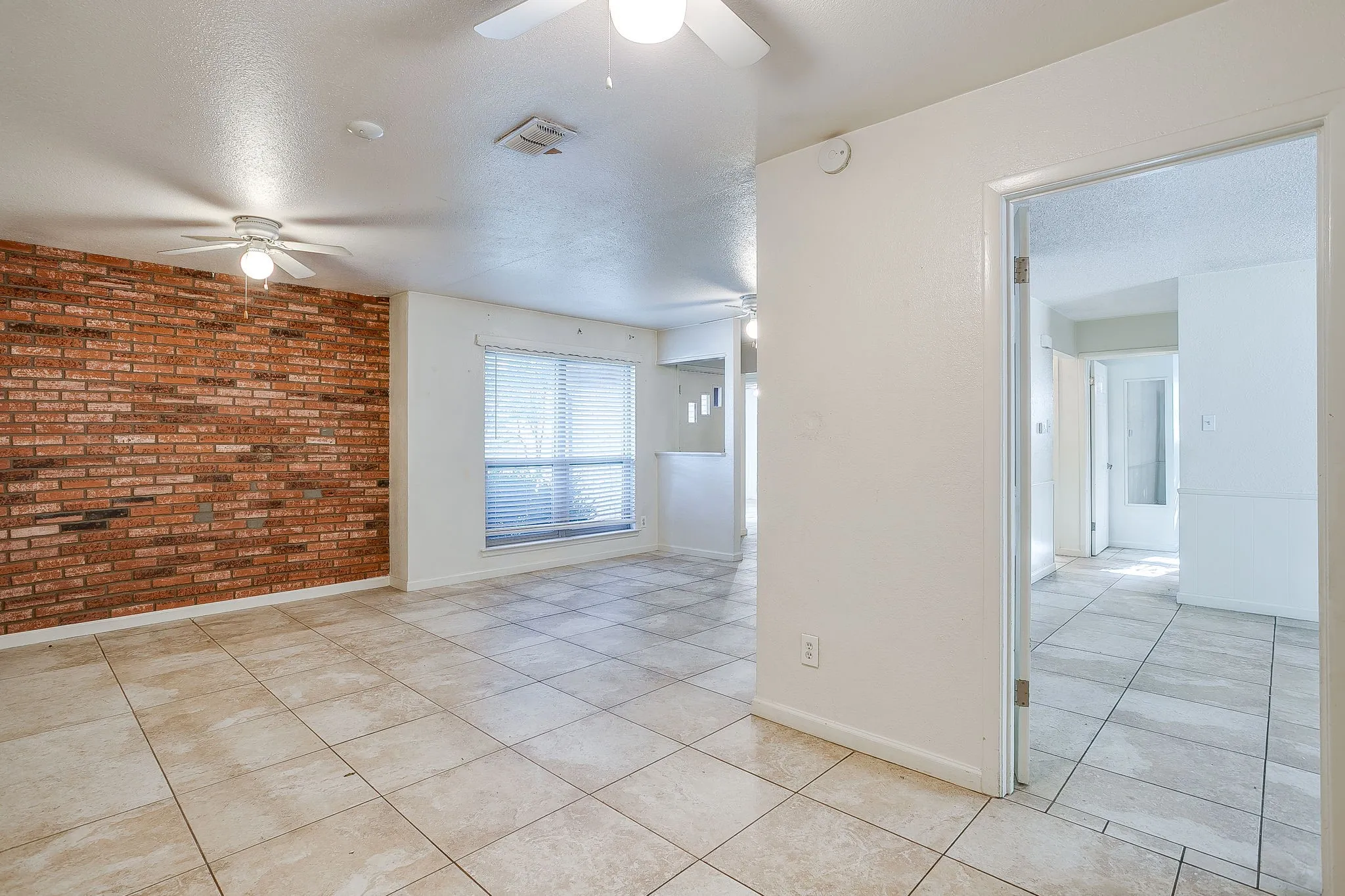 View from the dining area - Living room to the Left , doorway into the kitchen on the Right
