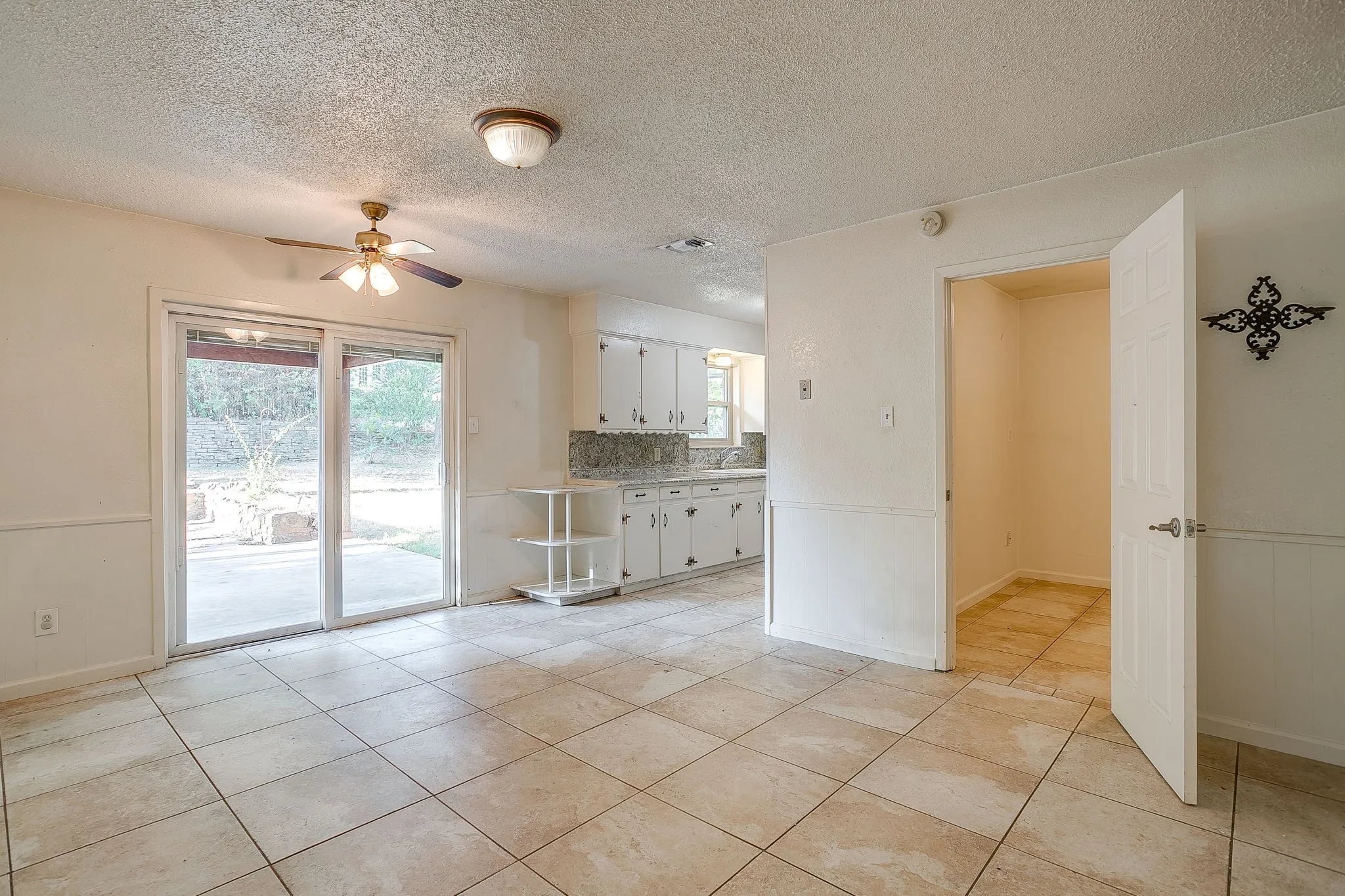 Breakfast area with kitchen beyond.  Open door way leads to the living room.