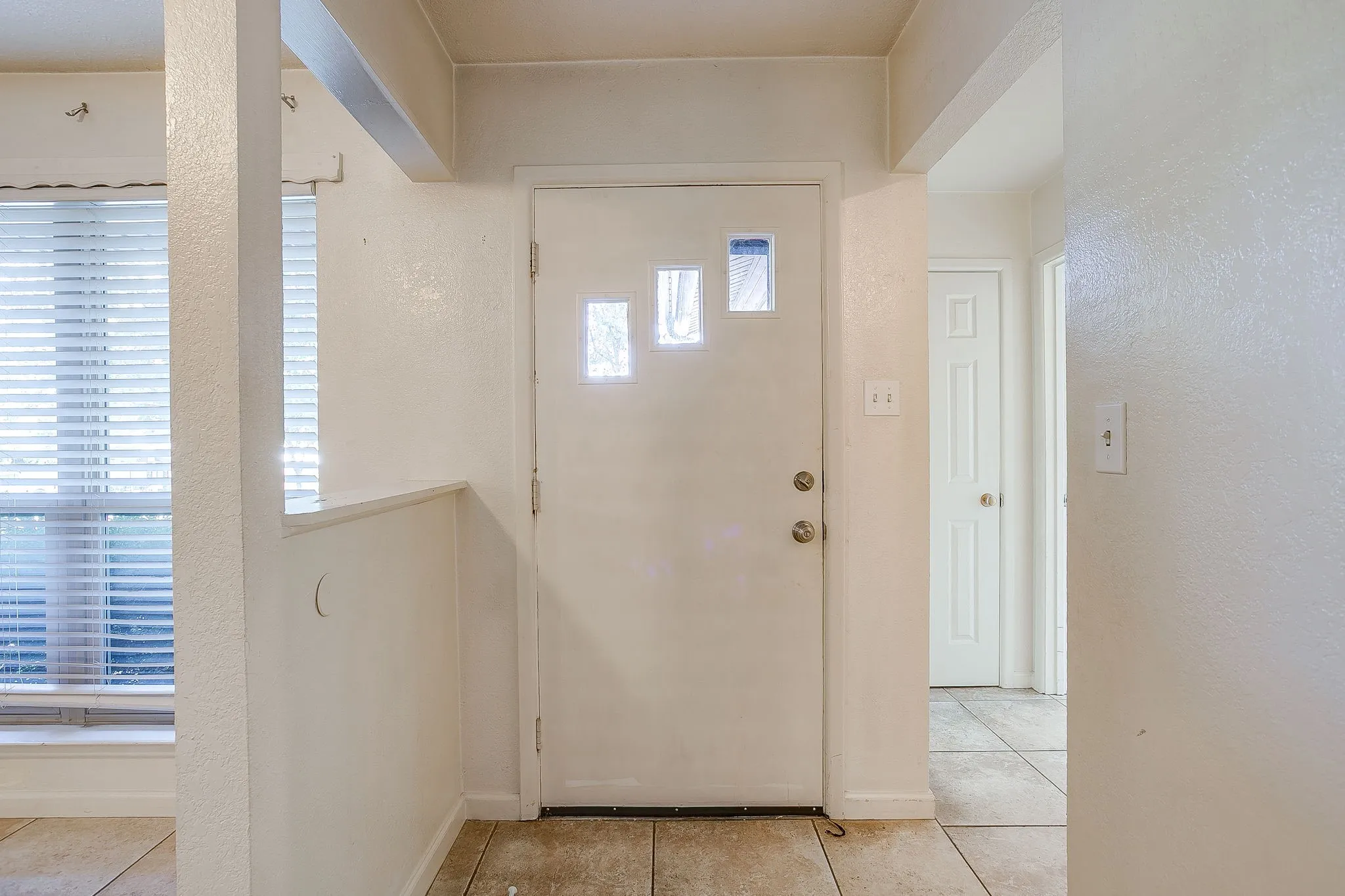 Practical tile floors throughout