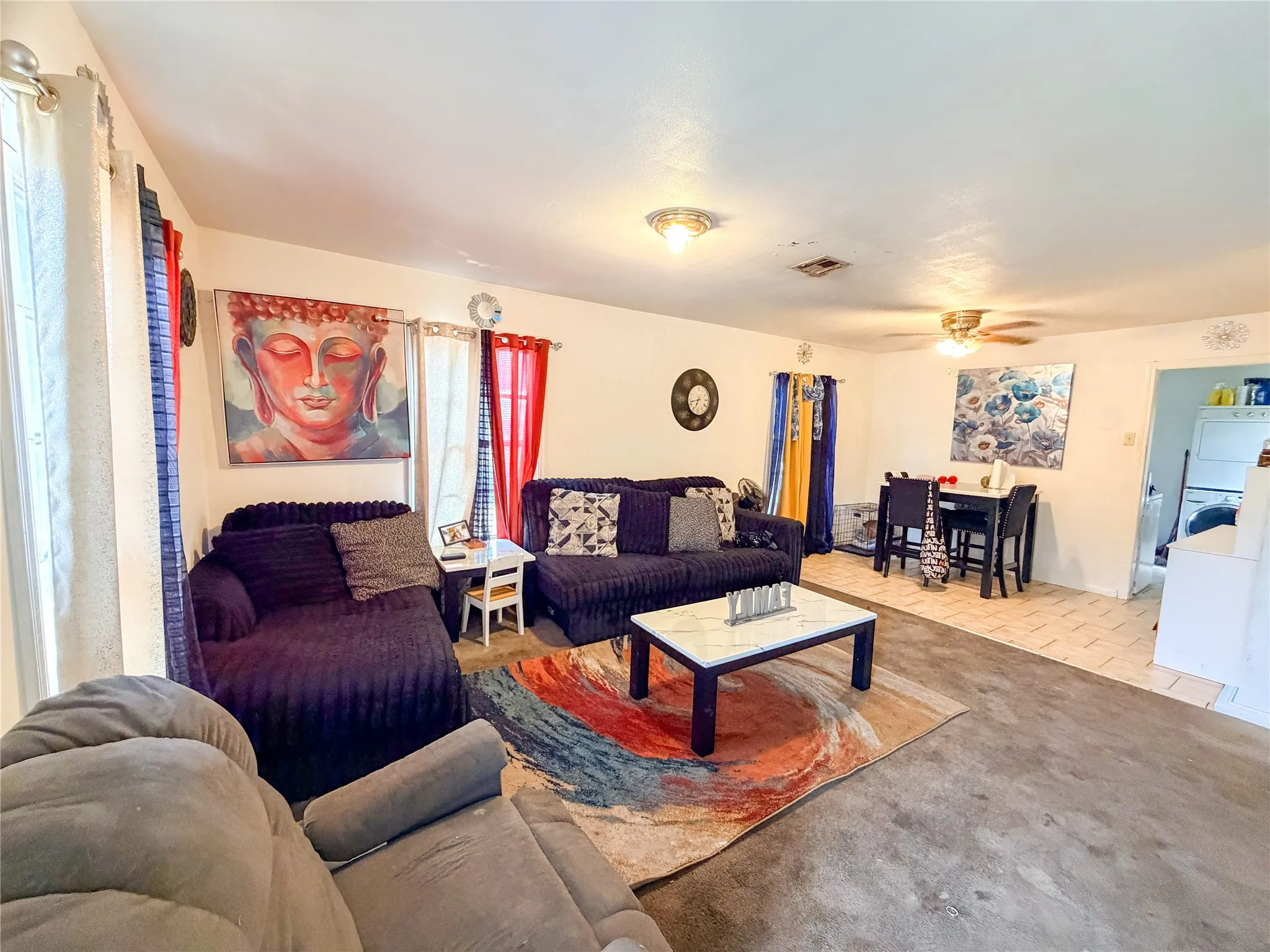 Living area featuring mixed flooring with a tile section, ceiling fan, and recessed lighting