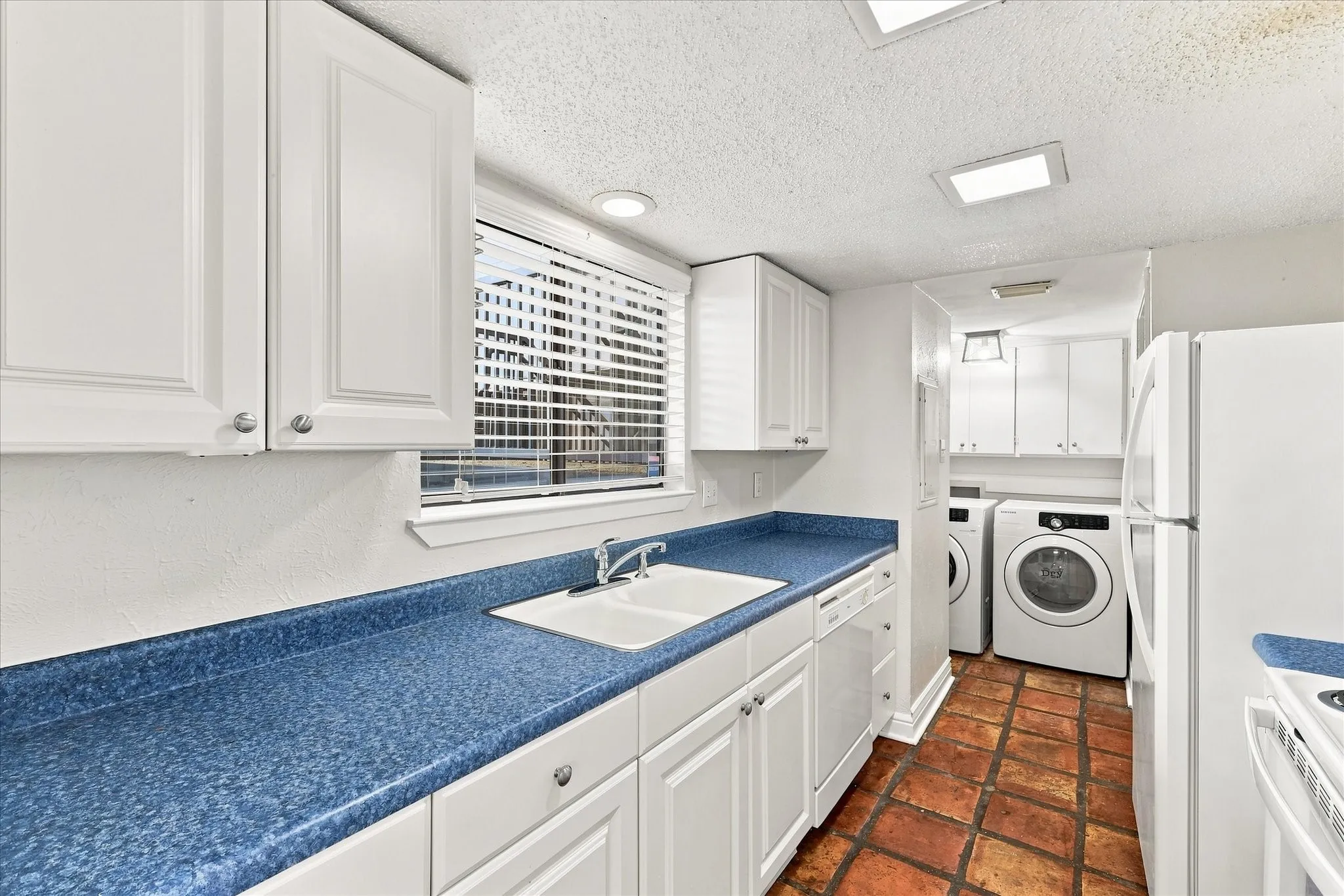 Galley Kitchen leads to laundry