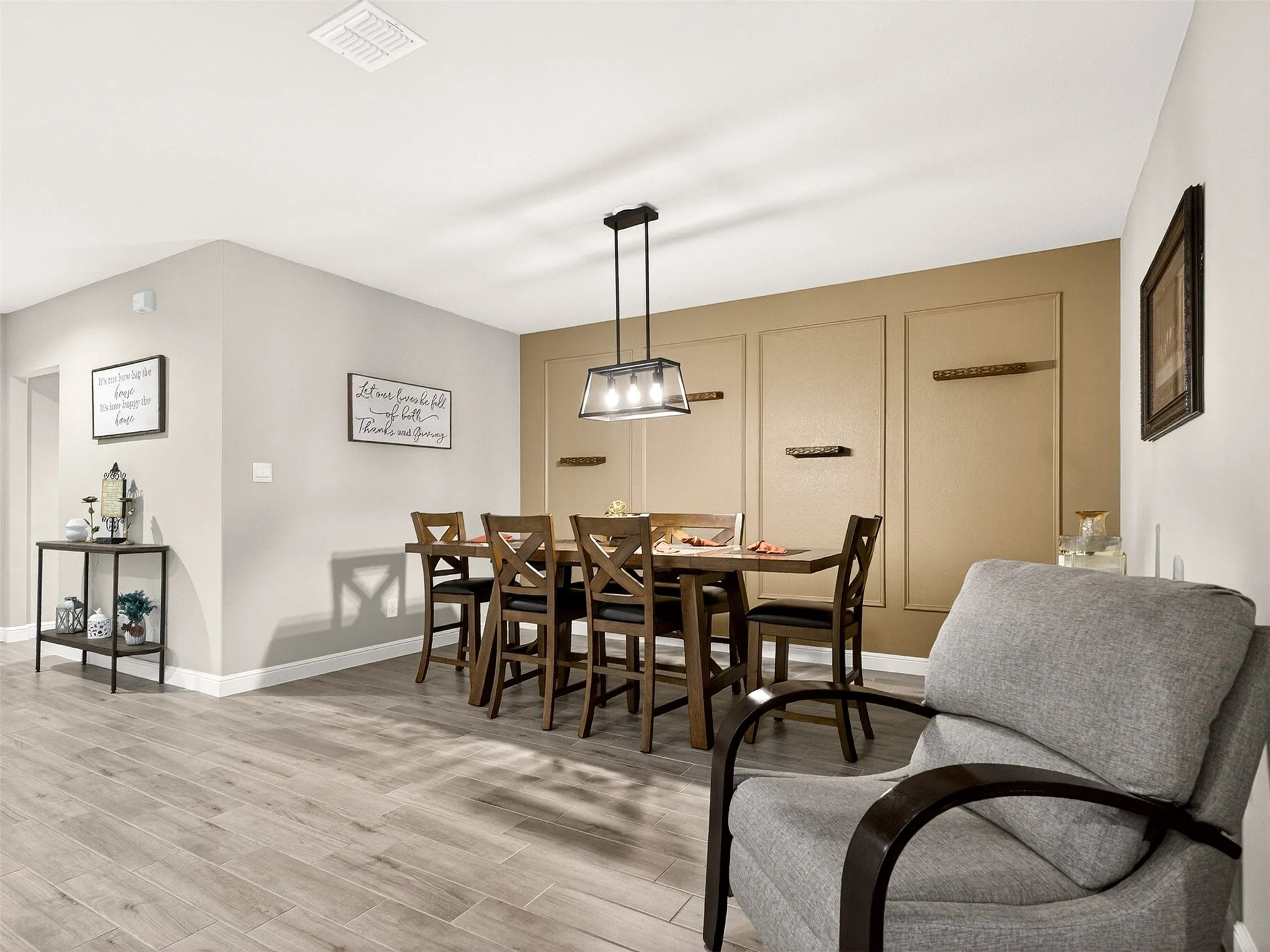 Wood-finish plank flooring throughout