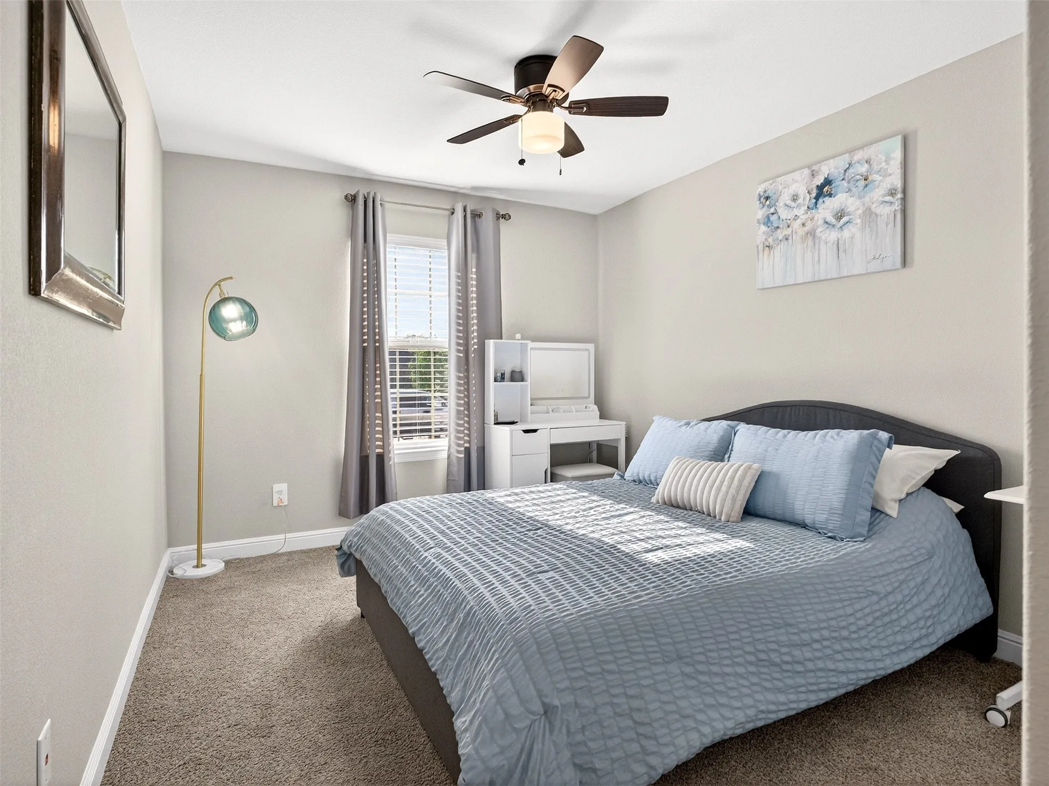 Recessed window with blinds and drapes