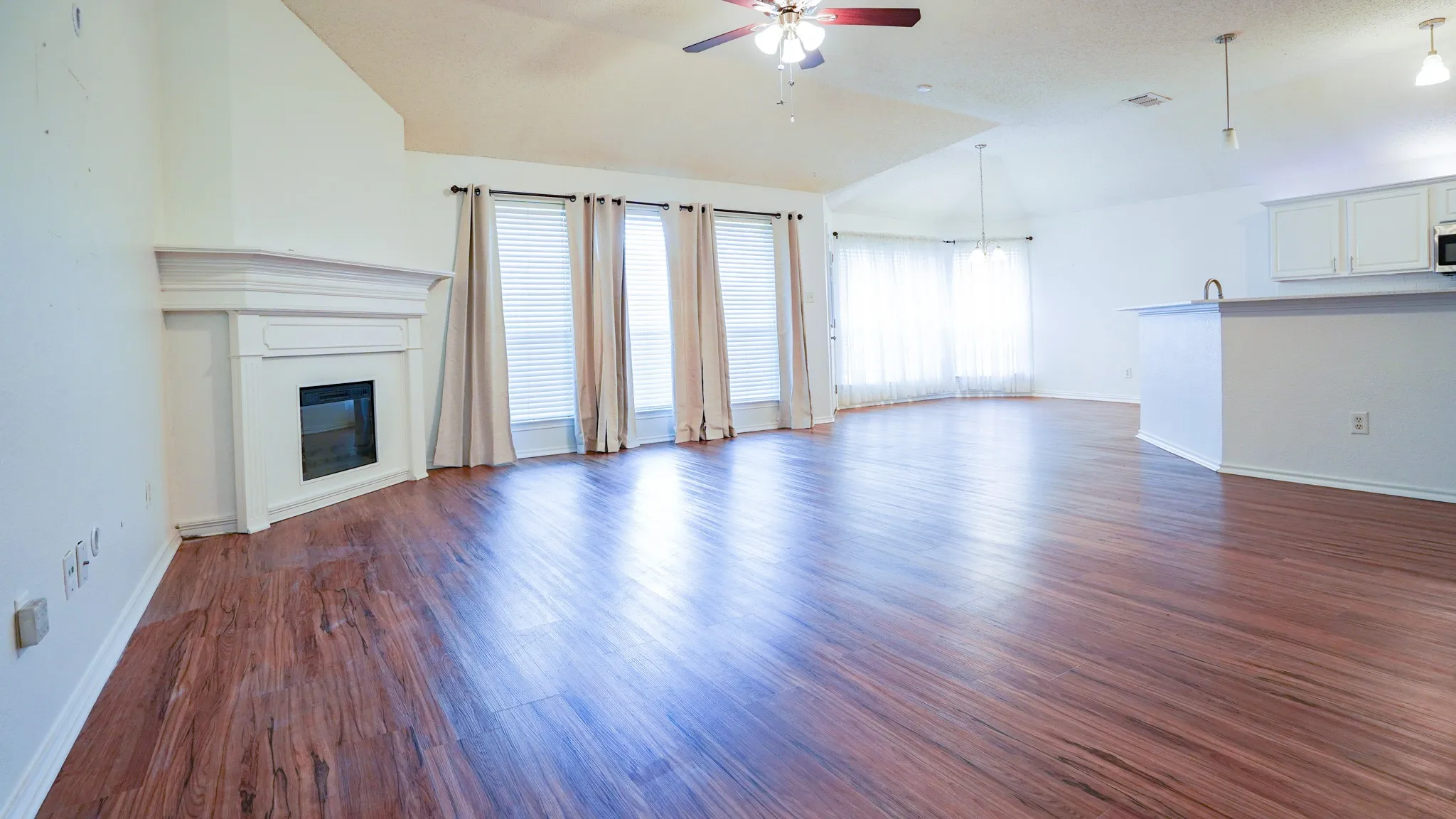 Open living with fireplace