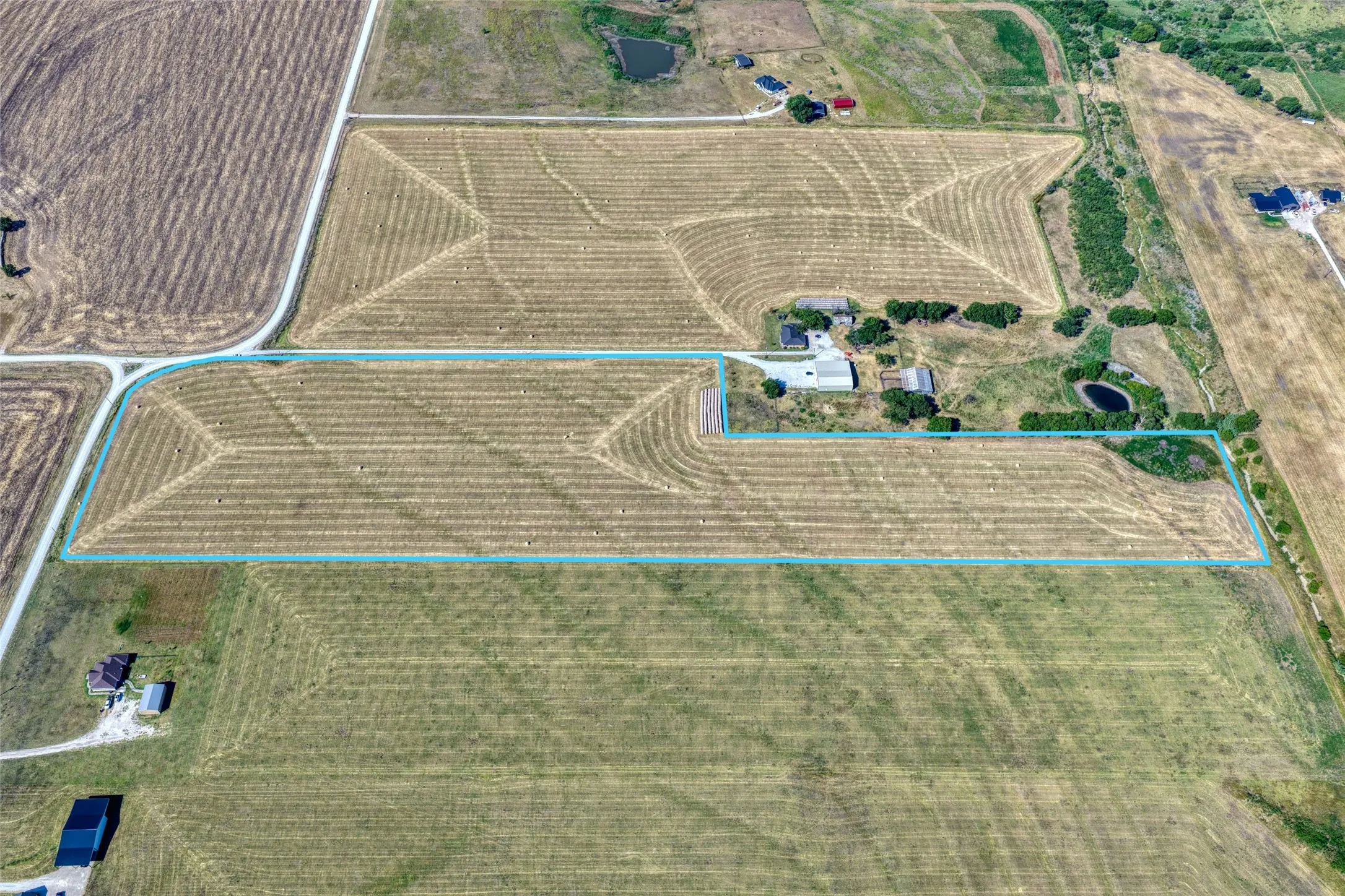 Aerial Boundary Survey. Presenting the property's perimeter as defined by the provided blue outline