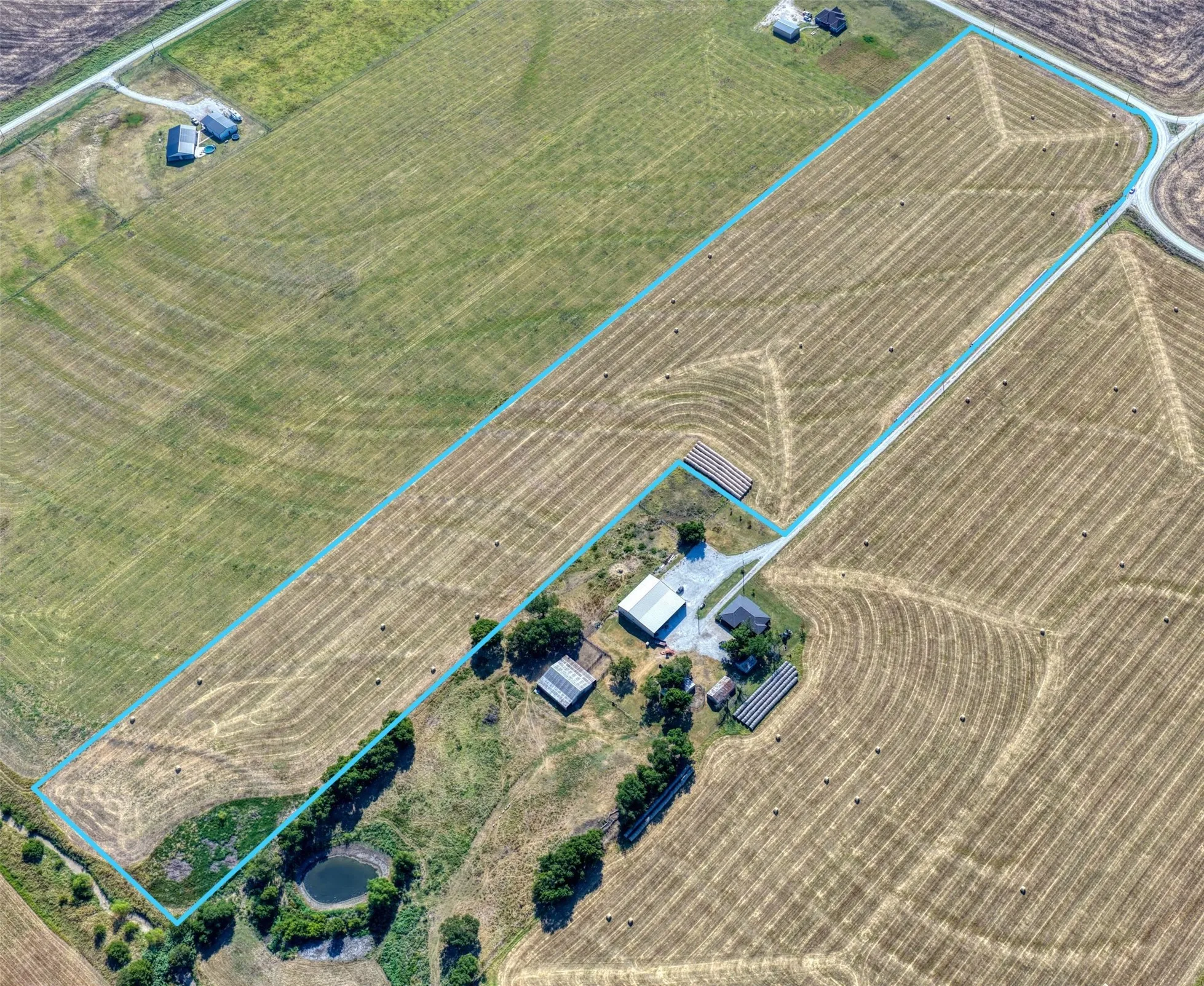 Property Survey. An aerial representation of the property with delineated boundaries and structures