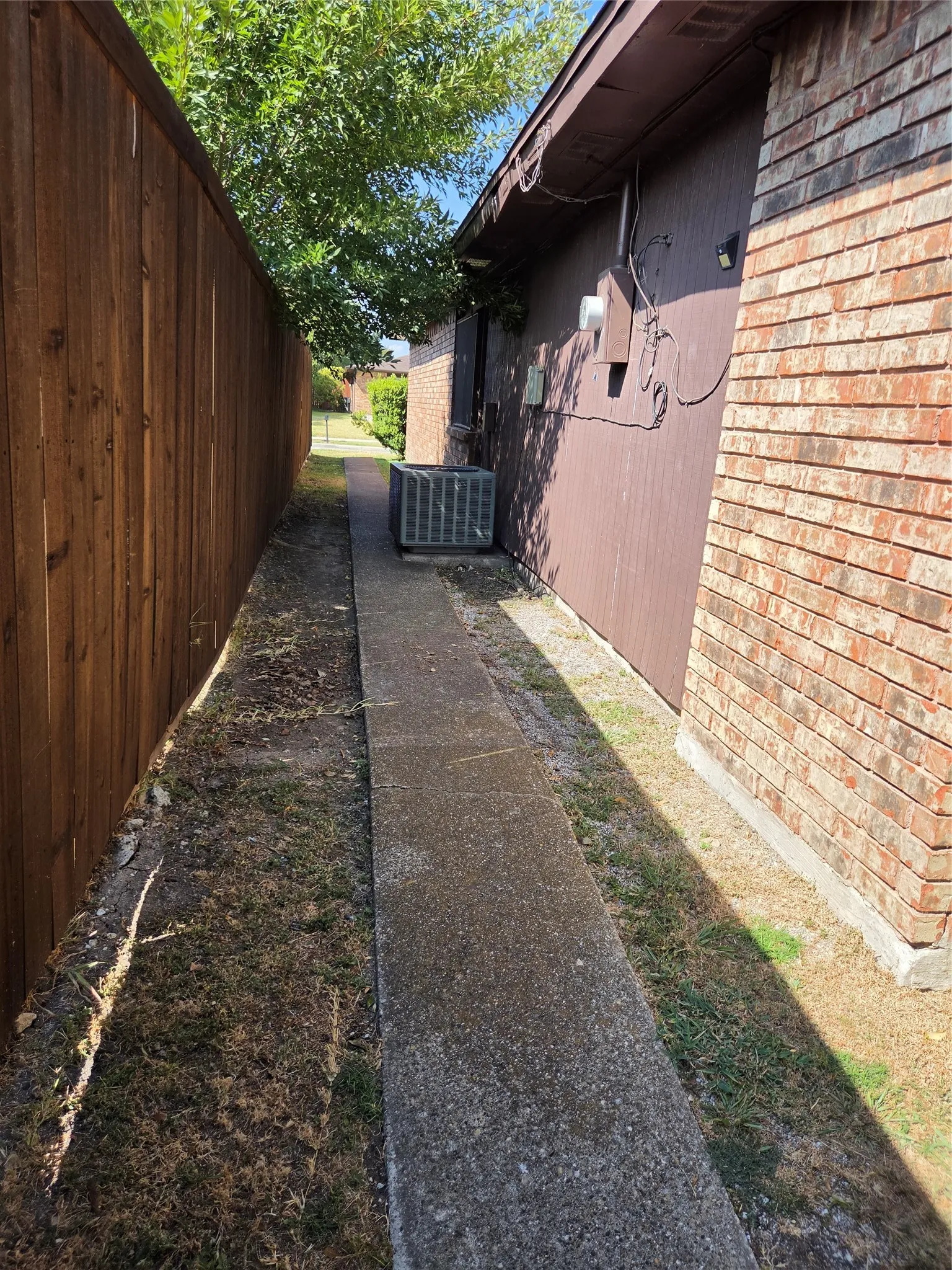 Perfect concrete sidewalk around the perimeter of the house