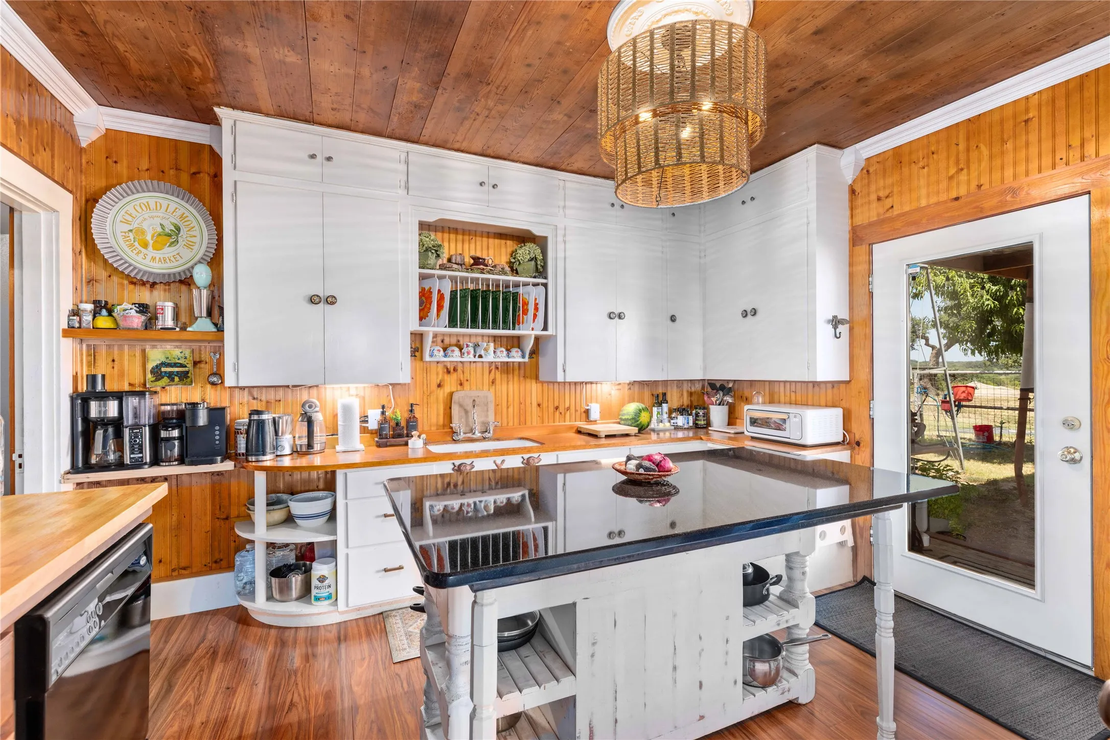 Country kitchen with granite top island
