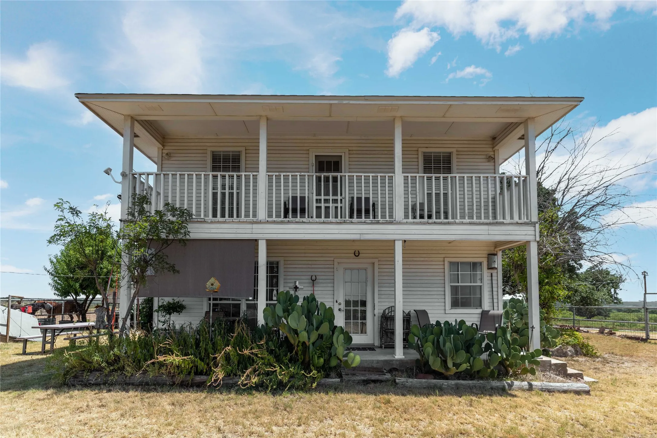 Covered porches on the 1st floor and the 2nd floor