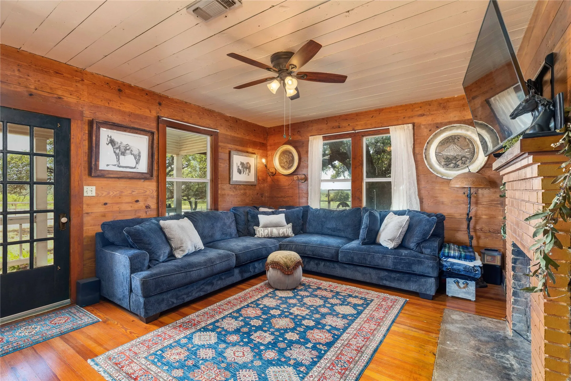 Second living room with wood burning fireplace