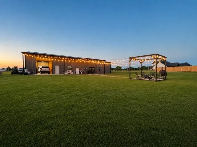 3 PLUS ACRES WITH A BACKYARD FOR THE WHOLE FAMILY TO PLAY IN RAIN OR SHINE - NIGHT OR DAY!