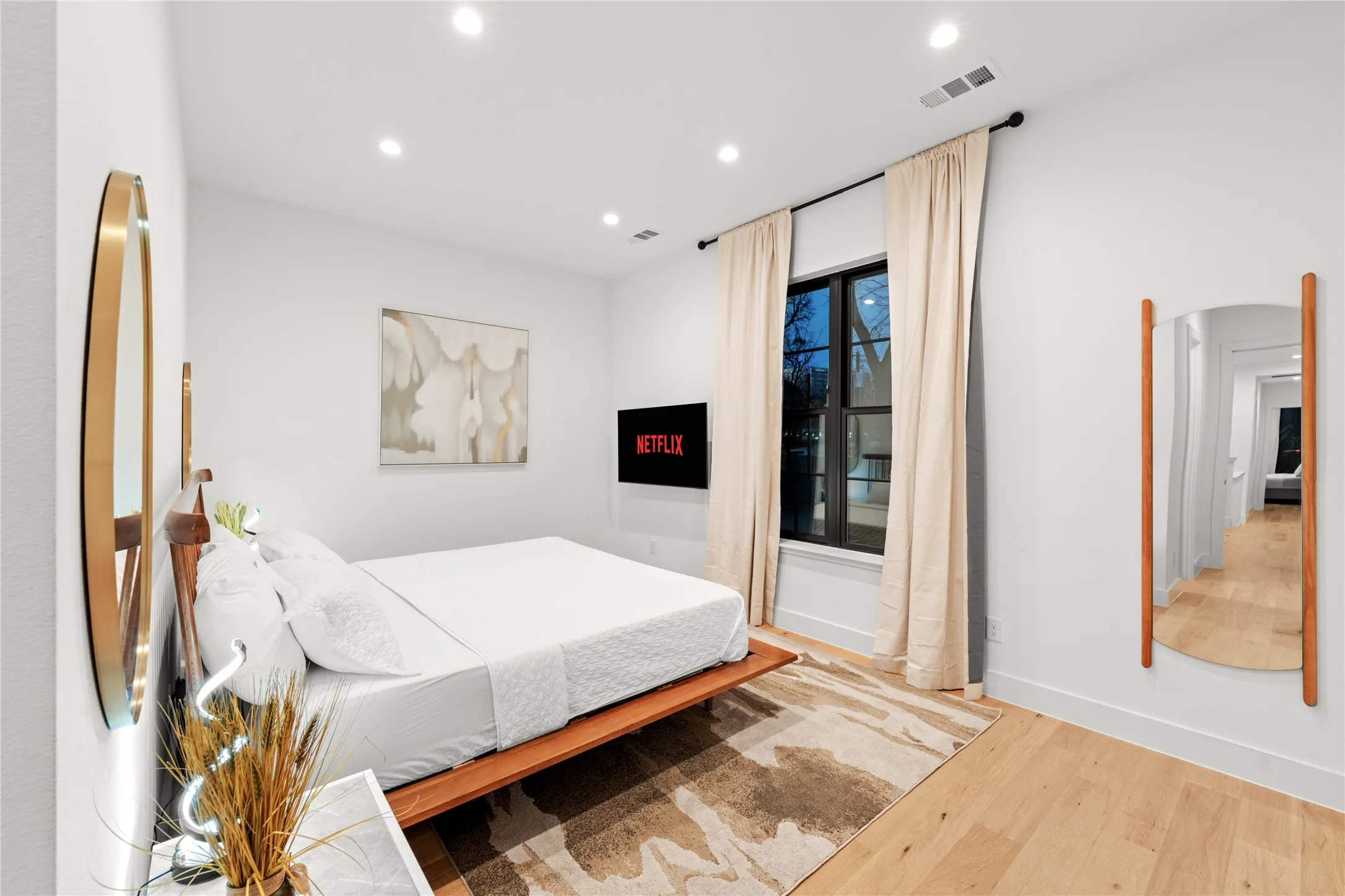 Primary bedroom over looking backyard.
