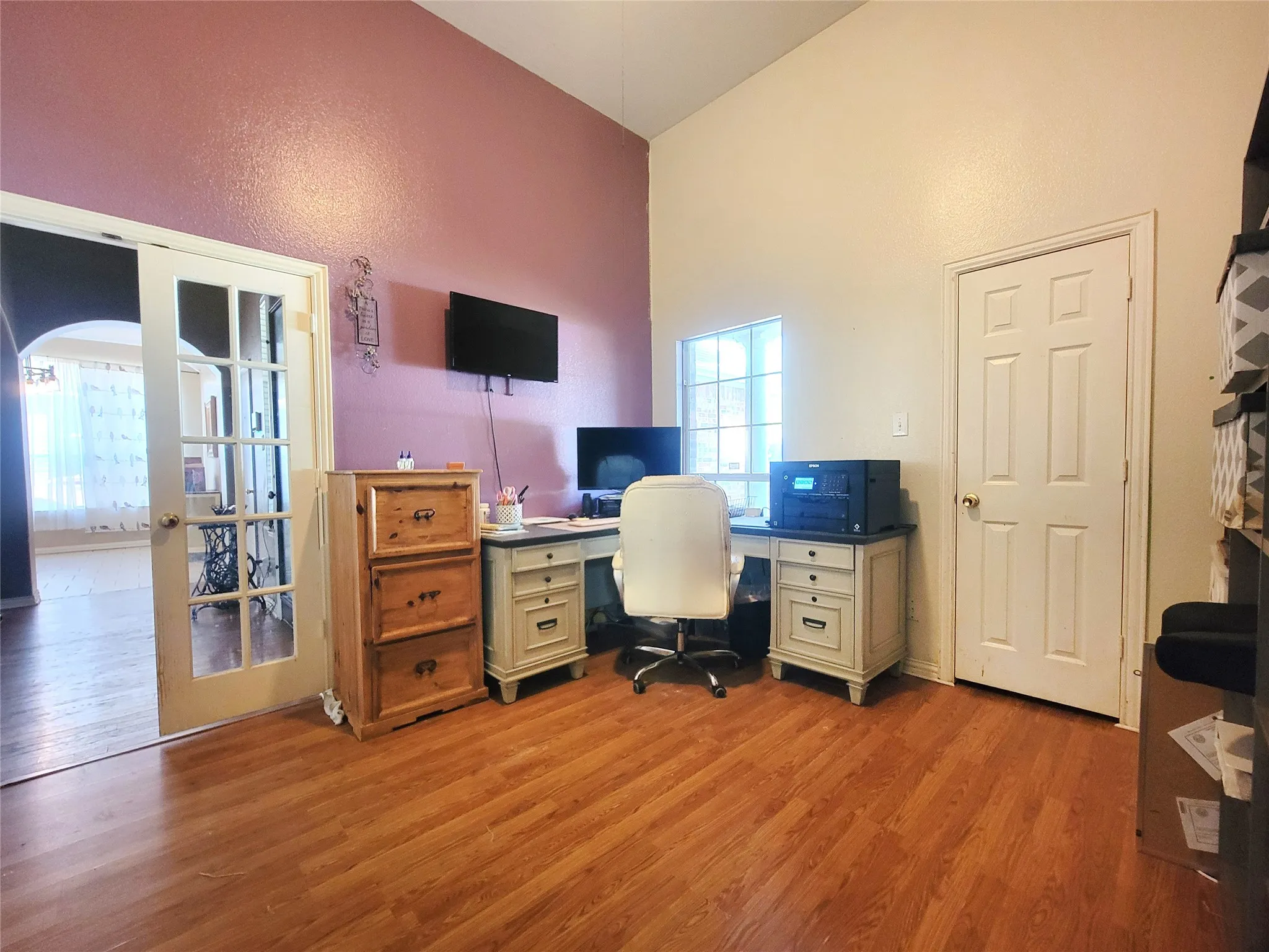 Bedroom OR Office has vaulted ceilings, walk in closet and private door to bathroom