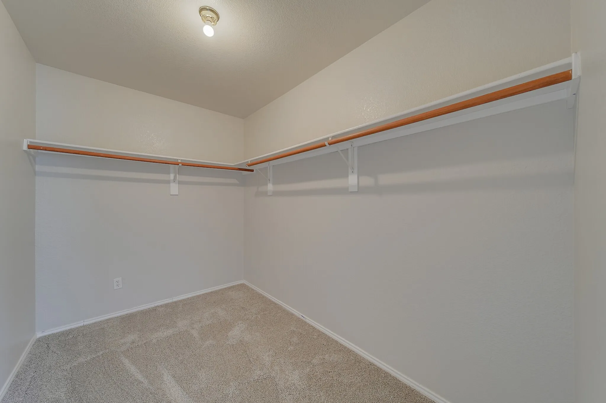 Built-in closet shelving and hanging rods