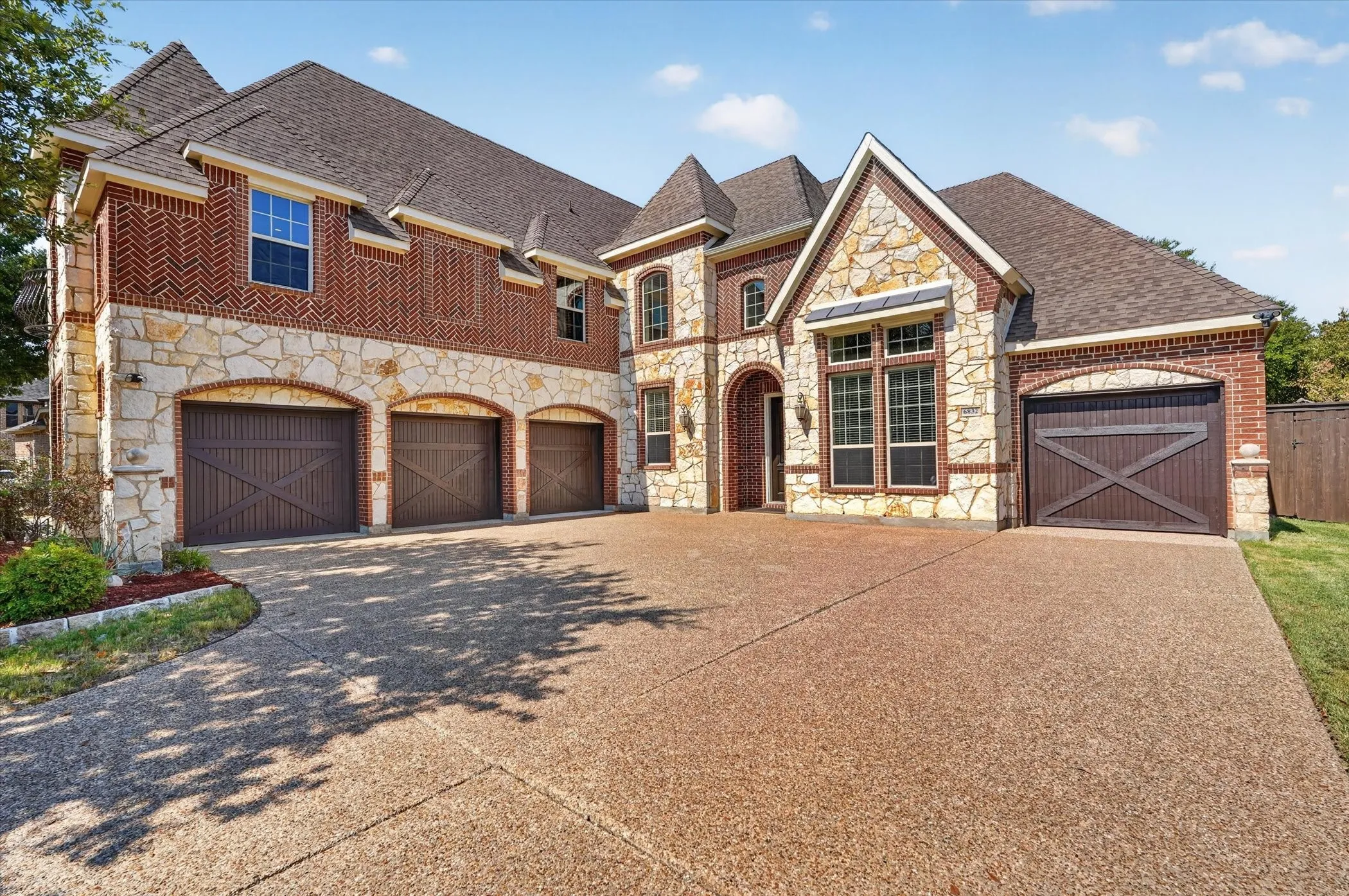 Stunning executive pool home in Grand Peninsula with 4 car garage, pool and no rear neighbors!