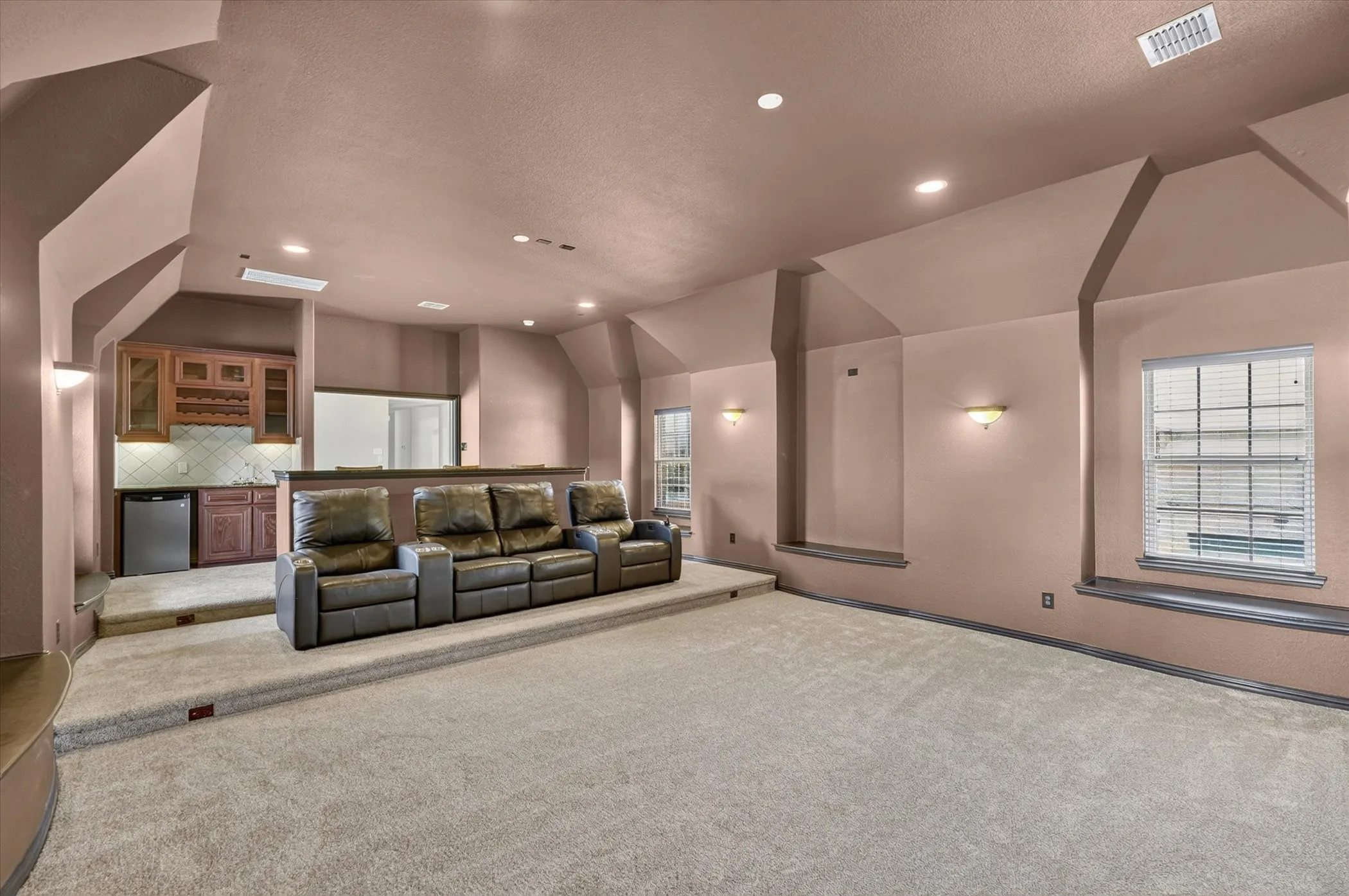 Large media room is prewired for sound.