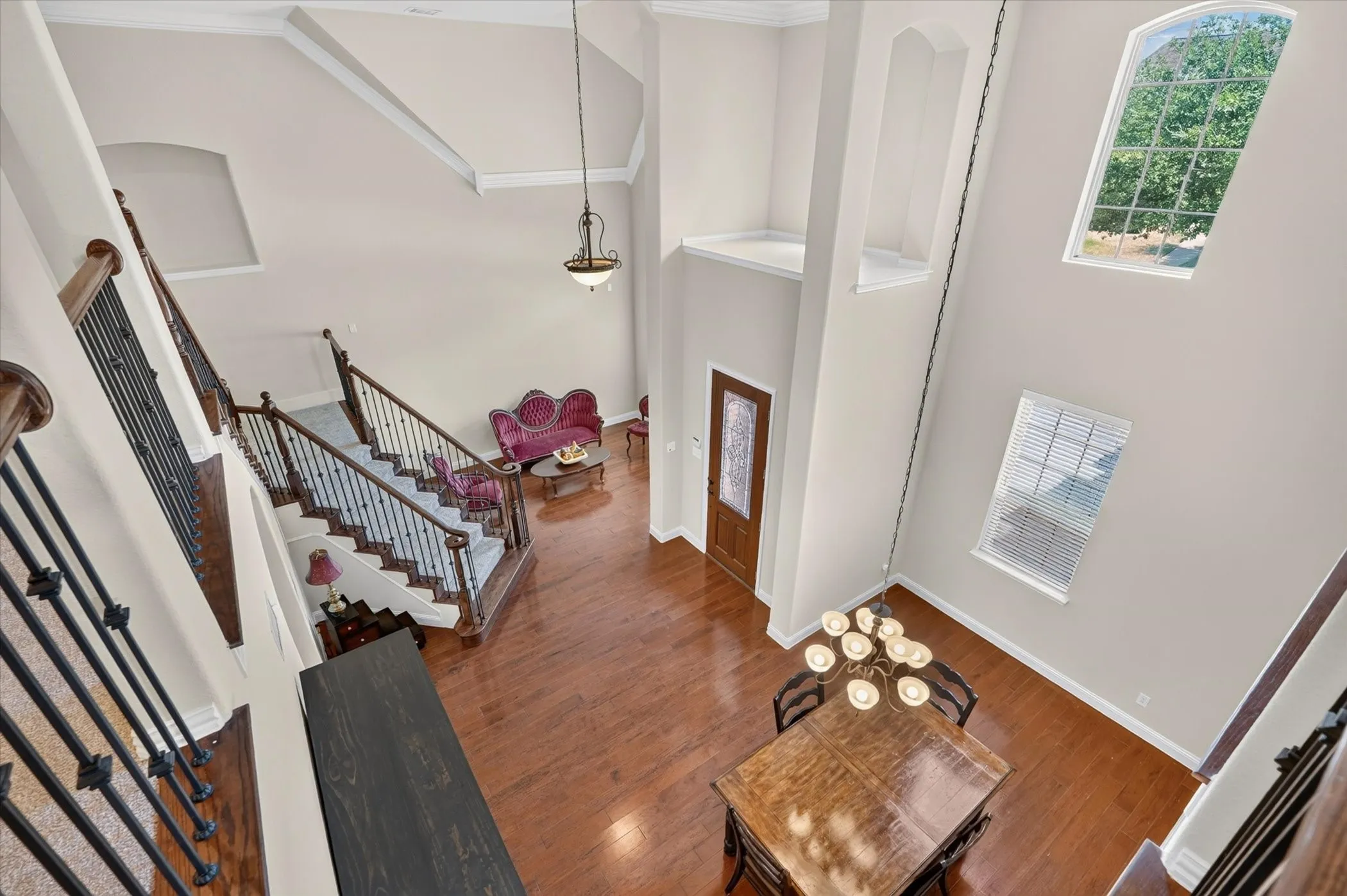 Beautiful view from the game room of the foyer, dining room and living room below.