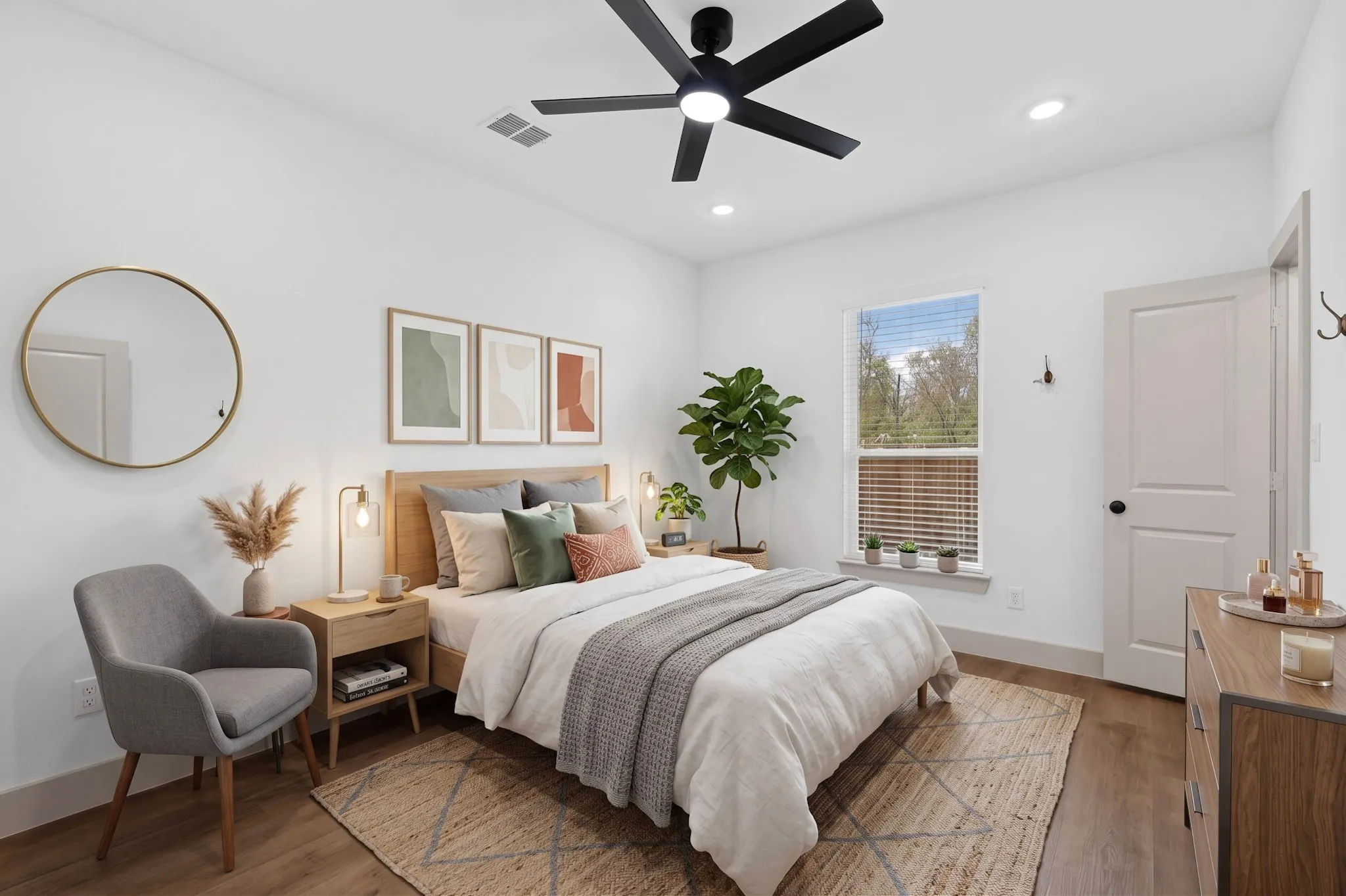  (Virtual Staging) White walls and wood-finish flooring complement the natural light