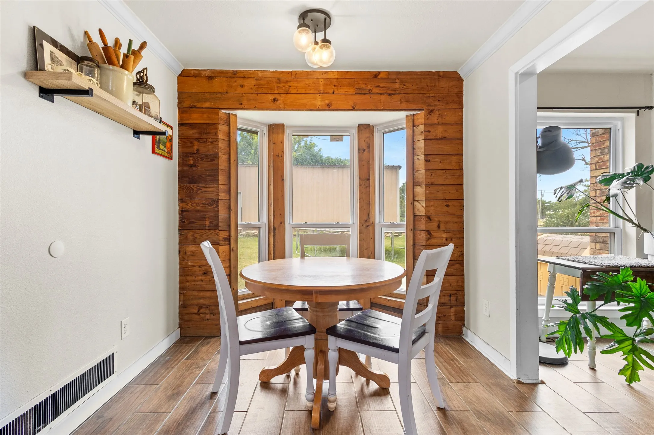 Bay window with wood-paneled surround