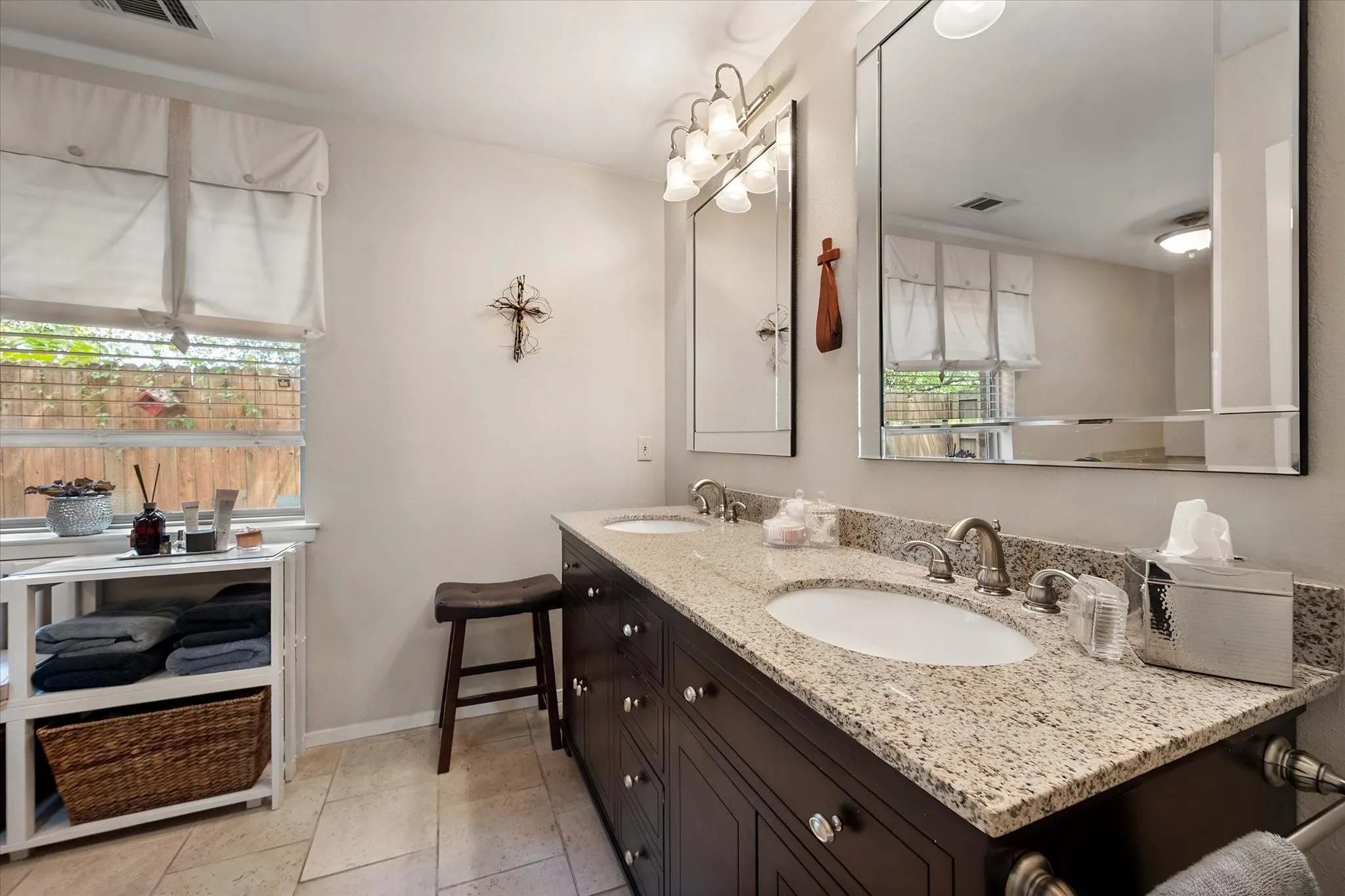 Renovated primary bath with separate tub and shower.