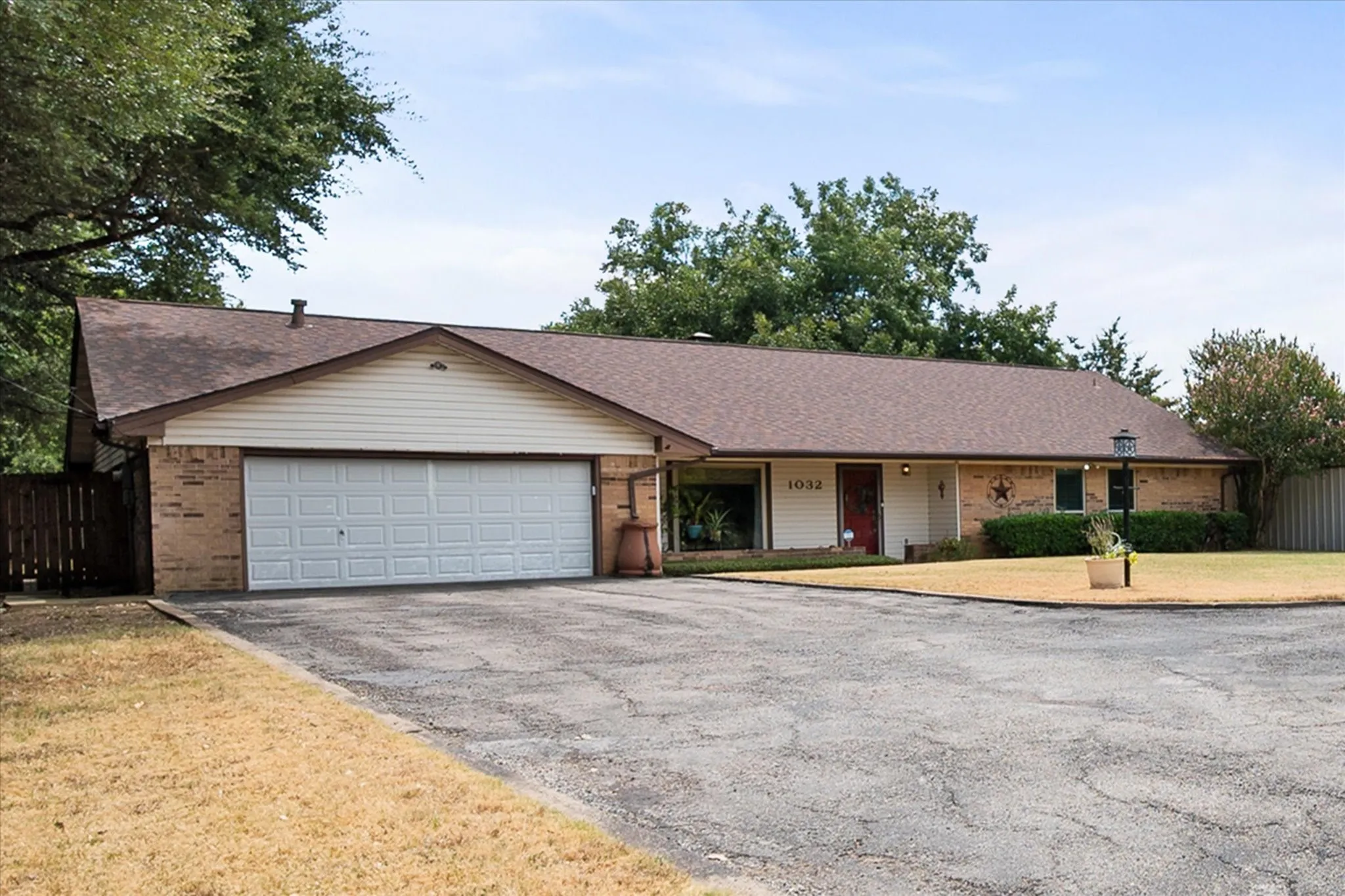 Xtra wide driveway with circle drive.