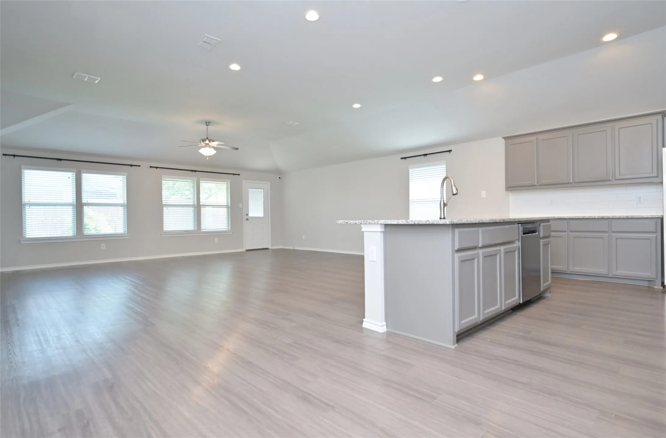 Kitchen facing Dining & Living