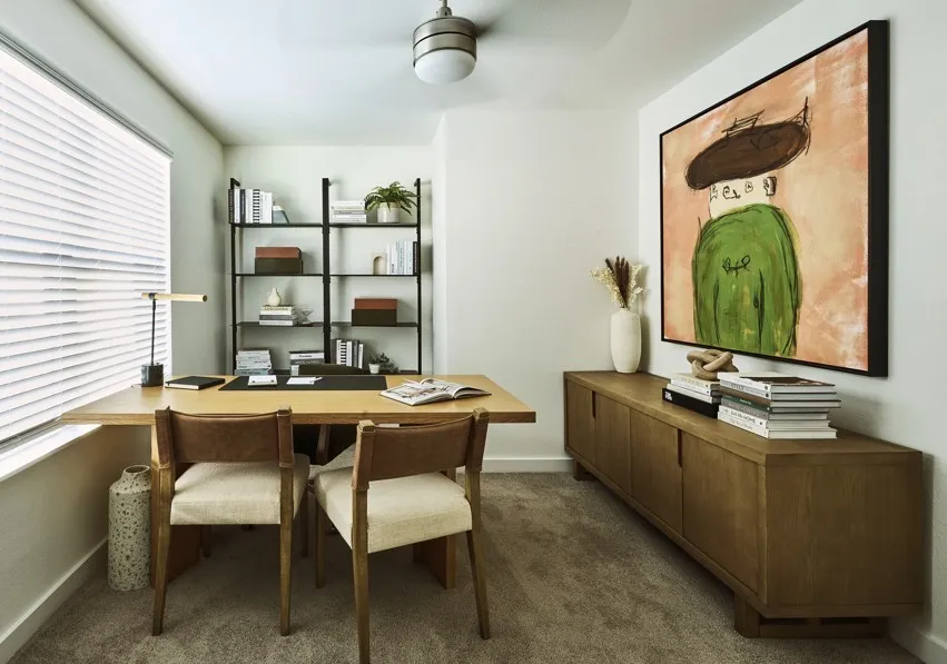 Home office with carpet flooring, ceiling fan, and plenty of natural light