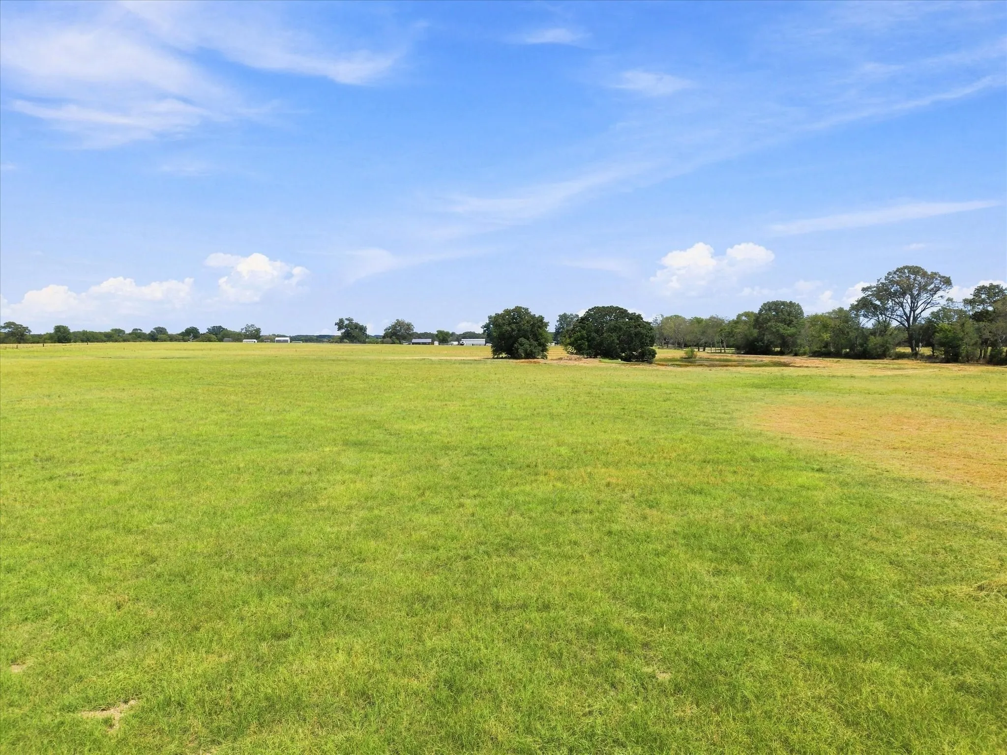 18AC of pasture with Stocked Pond