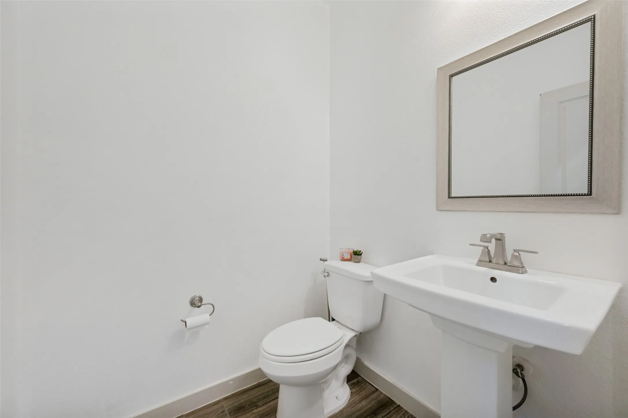 Half bath, powder room on level one.