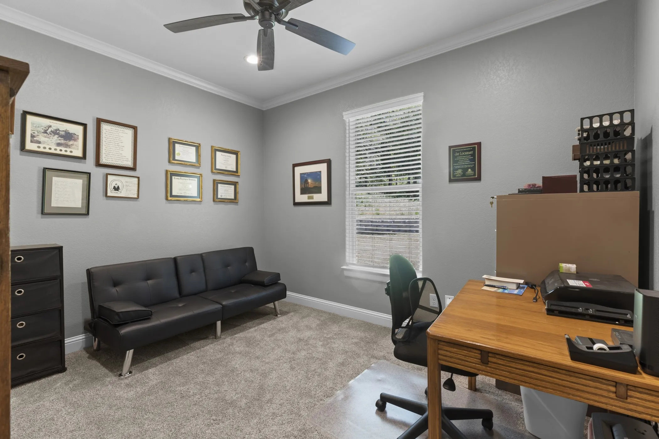 Recessed lighting, crown molding, ceiling fan, and a double-paned window