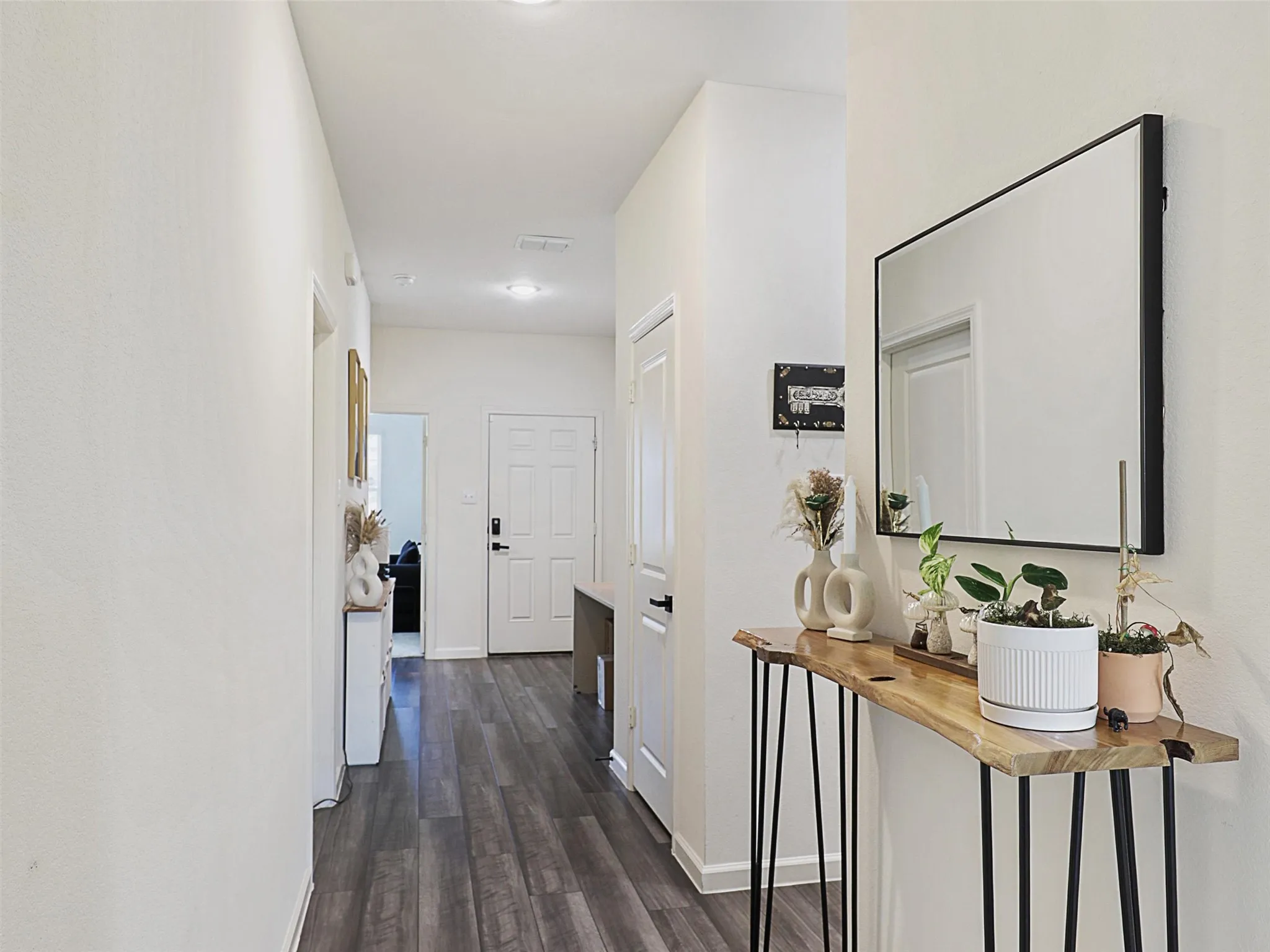 As you enter, the home opens into the main living area.