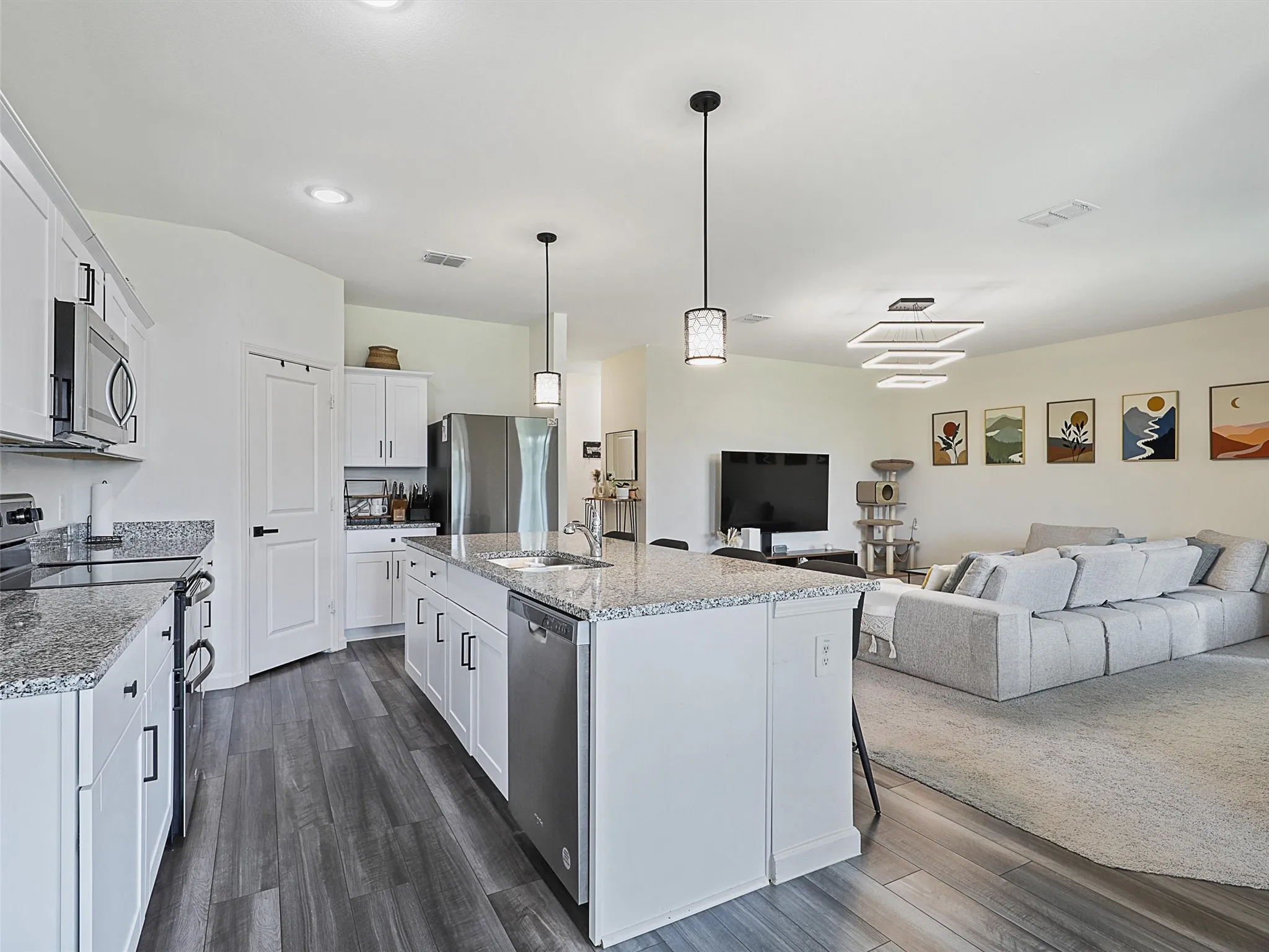From the kitchen, you can look directly into the living area.