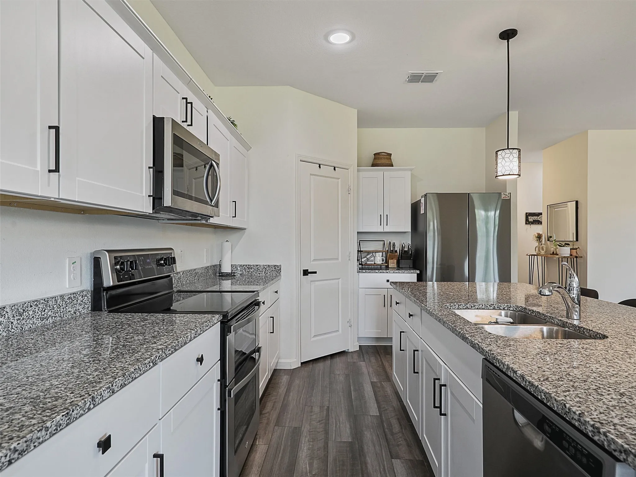 Refrigetator stays with appliances to complete the kitchen.