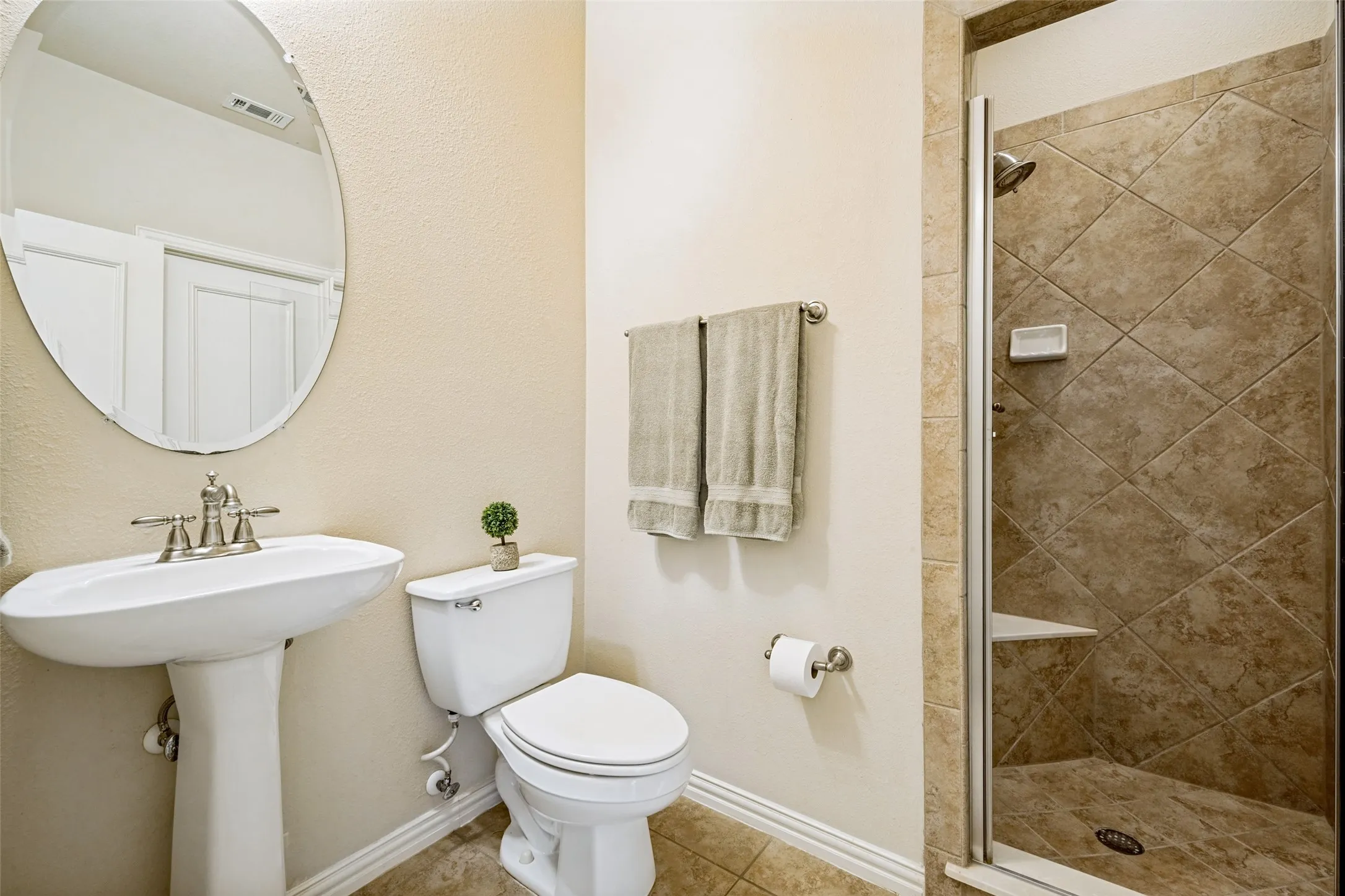 Downstairs Full Bathroom next to bedroom
