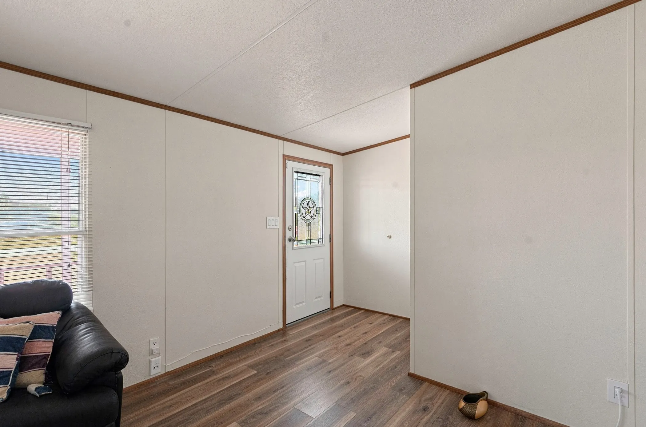 LVP throughout the main areas of the home - View of the Front Door entry way